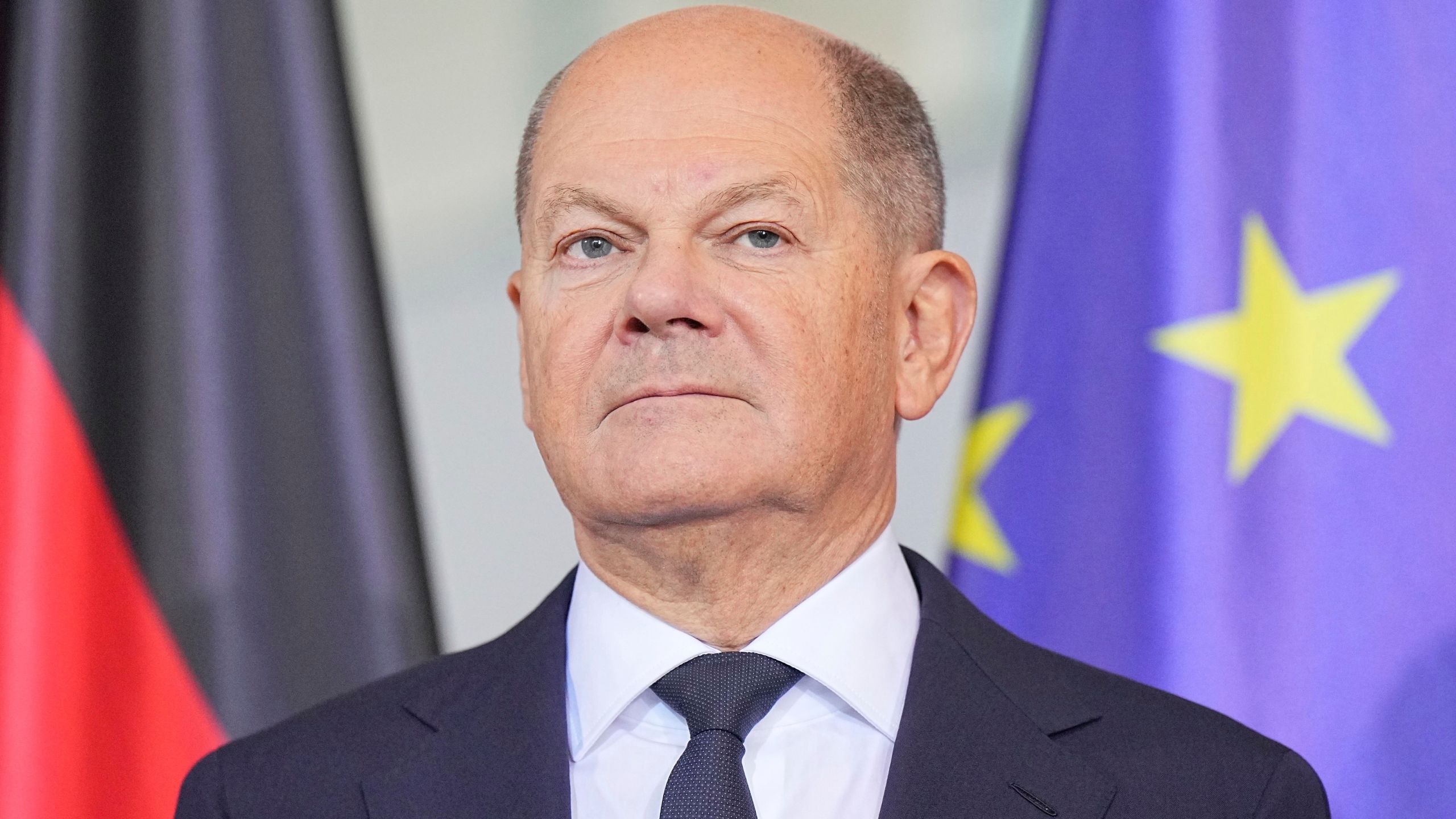 German Chancellor Olaf Scholz stands at the presentation of the annual report of the German Council of Economic Experts, in Berlin, Wednesday Nov. 13, 2024. (Michael Kappeler/dpa via AP)