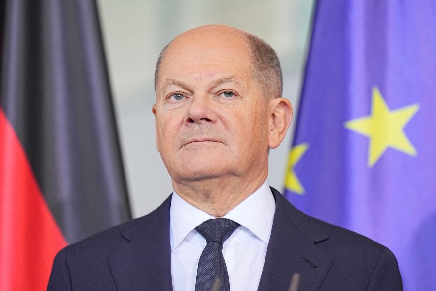 German Chancellor Olaf Scholz stands at the presentation of the annual report of the German Council of Economic Experts, in Berlin, Wednesday Nov. 13, 2024. (Michael Kappeler/dpa via AP)