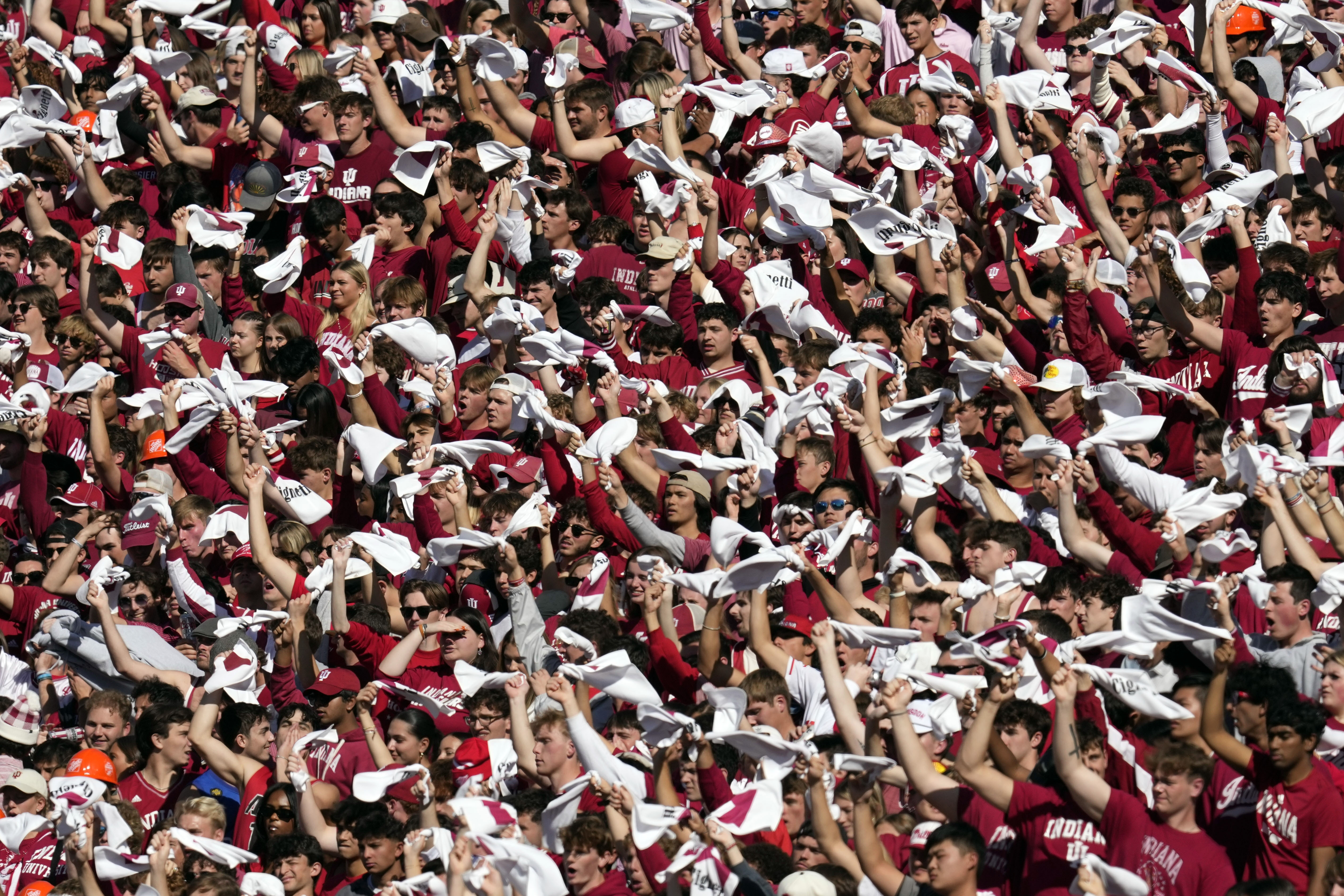 Indiana students cheer during the first half of an NCAA college football game between Indiana and Washington, Saturday, Oct. 26, 2024, in Bloomington, Ind. (AP Photo/Darron Cummings)