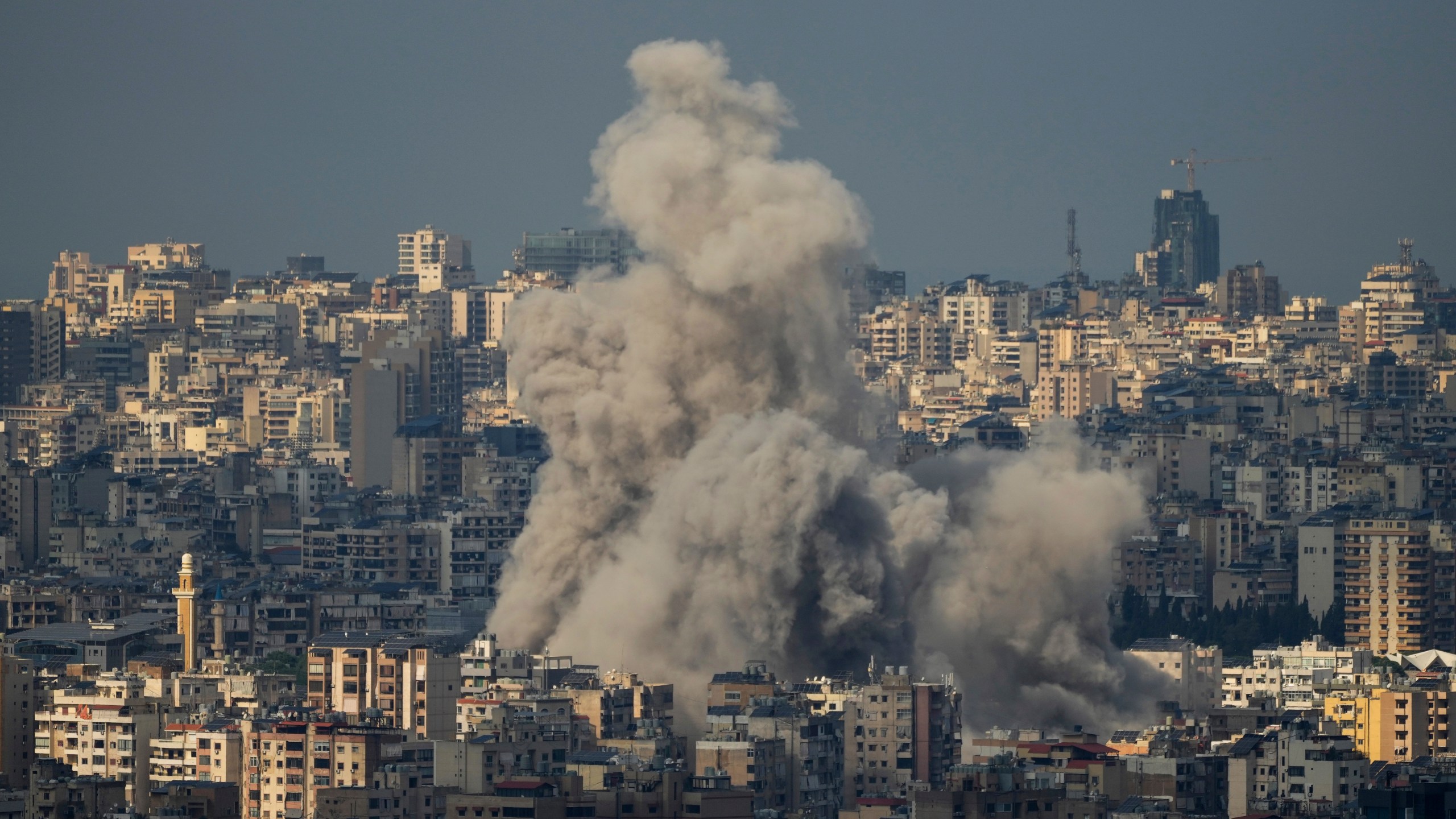 Smoke billows following Israeli airstrikes in Dahiyeh, Beirut, Lebanon, Wednesday, Nov. 13, 2024. (AP Photo/Hassan Ammar)