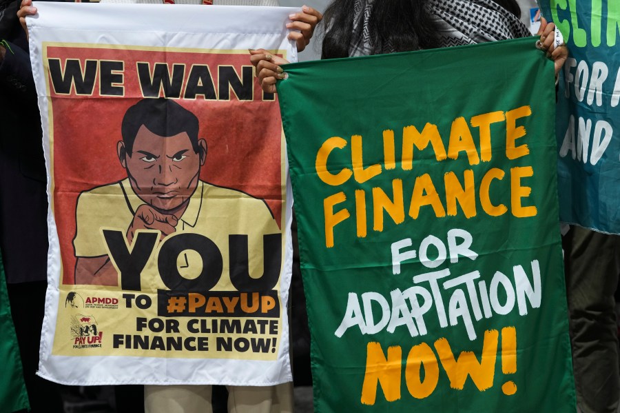 Activists participate in a demonstration for climate finance at the COP29 U.N. Climate Summit, Thursday, Nov. 14, 2024, in Baku, Azerbaijan. (AP Photo/Peter Dejong)