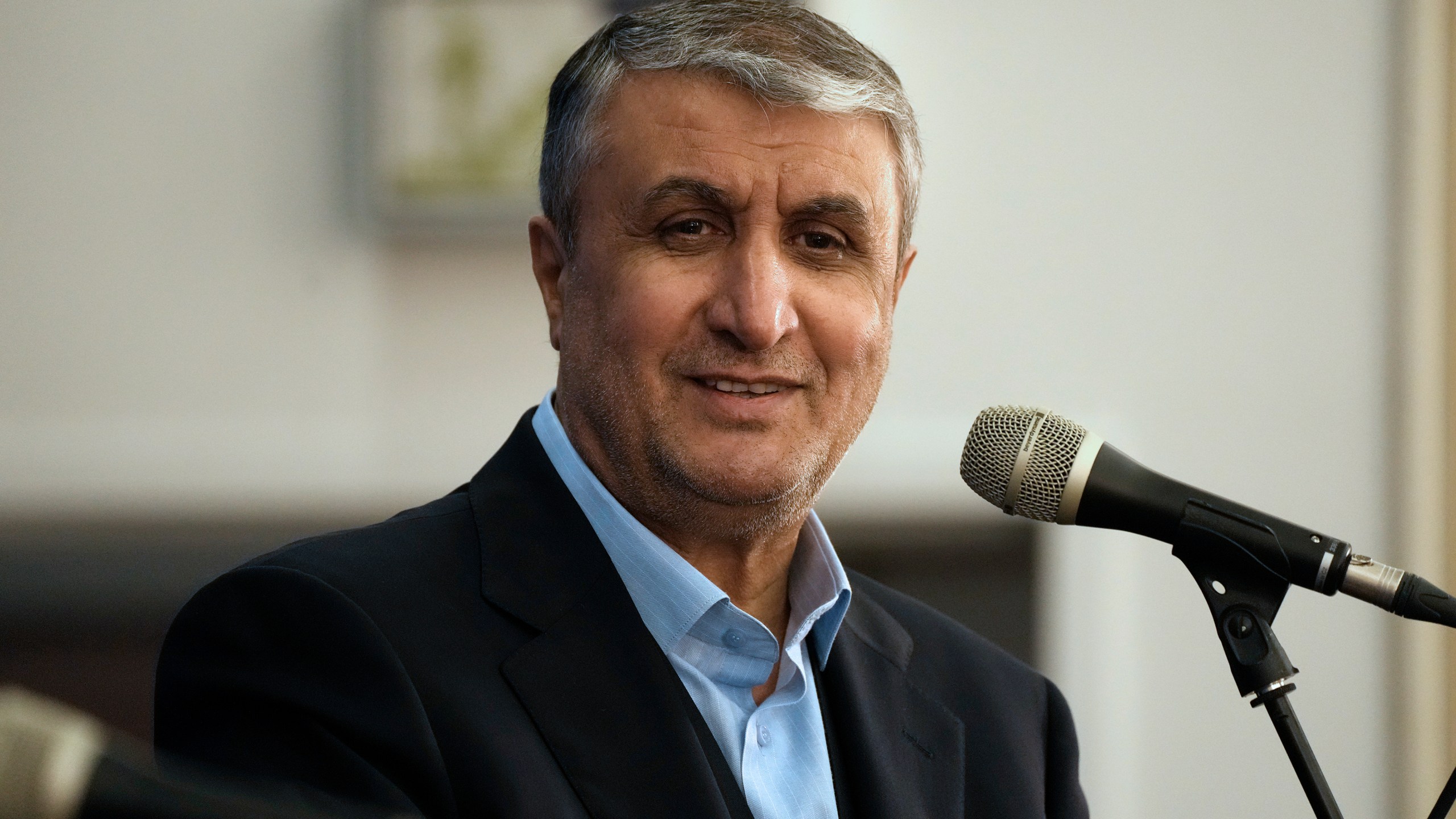 Head of Atomic Energy Organization of Iran Mohammad Eslami listens during his joint press conference with International Atomic Energy Agency (IAEA) Director General Rafael Mariano Grossi in Tehran, Iran, Thursday, Nov. 14, 2024. (AP Photo/Vahid Salemi)