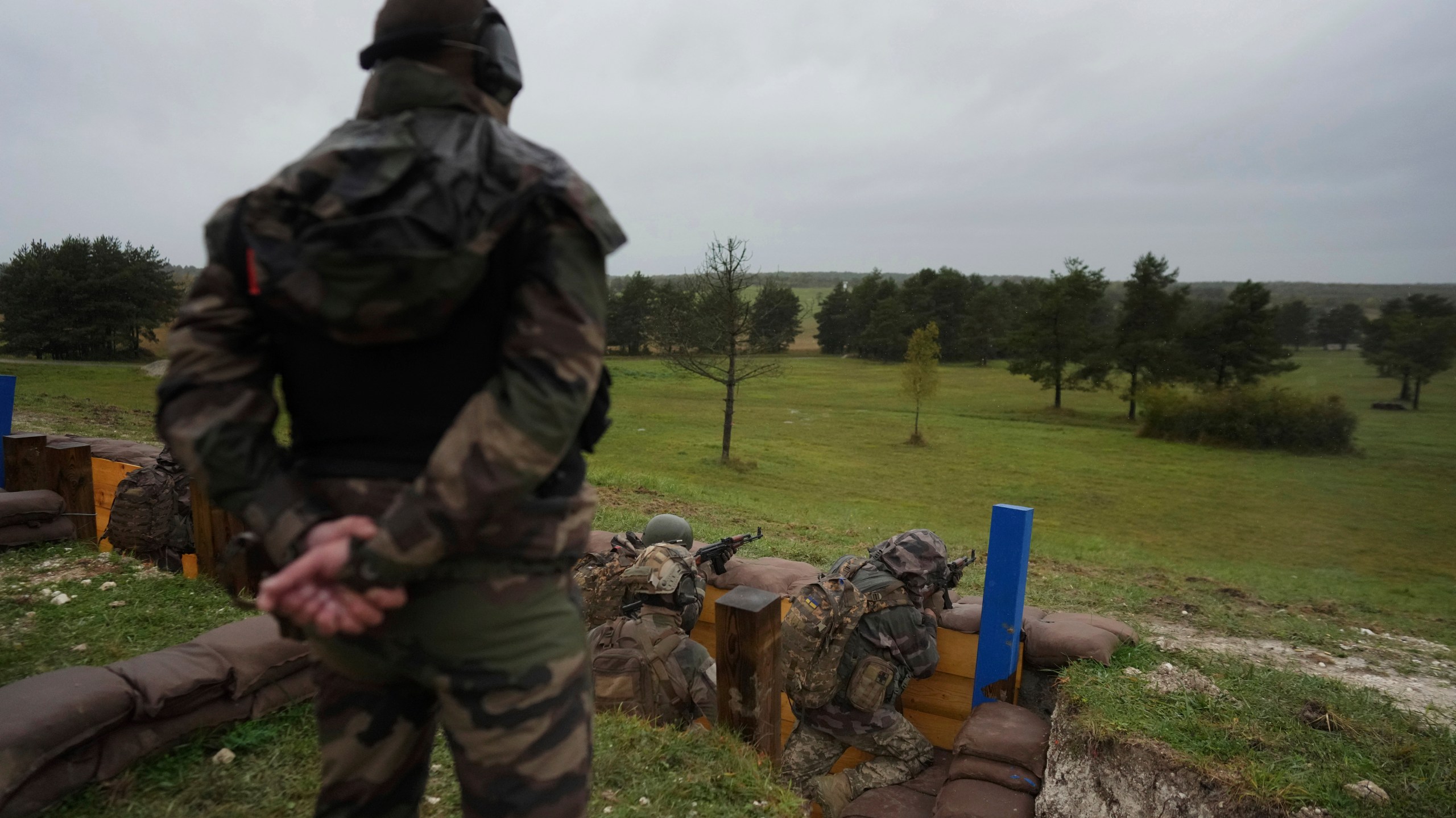 FILE - Ukrainian soldiers train at a military camp in eastern France, Wednesday, Oct. 9, 2024. (AP Photo/Thibault Camus, Pool, File)