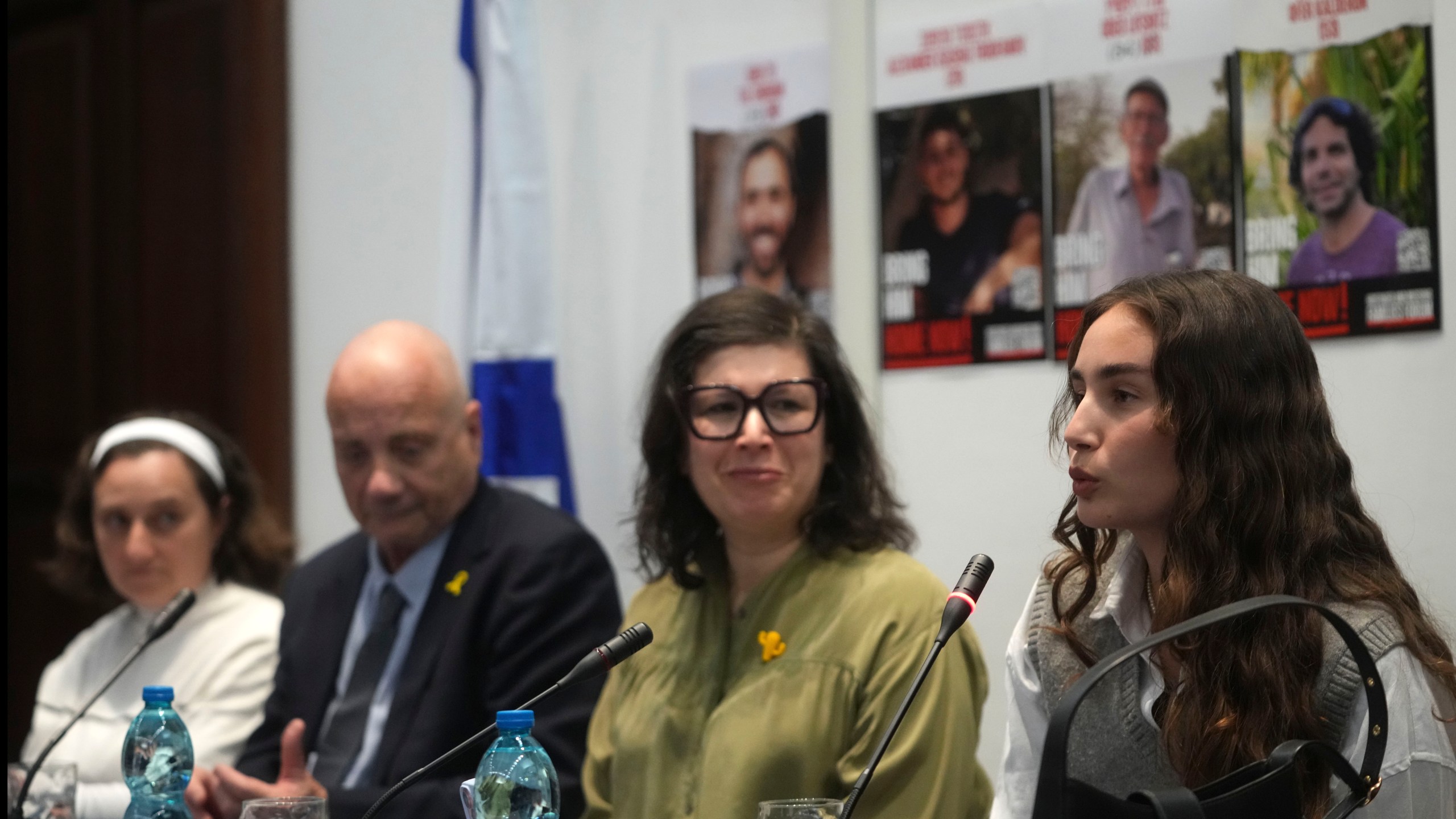 From left, Elena Troufanov, Louis Har, Sharon Lifschitz, and Gaya Kalderon former Israeli hostages and relatives of some still being held by Hamas attend a press conference in Rome, Thursday, Nov. 14, 2024. (AP Photo/Alessandra Tarantino)