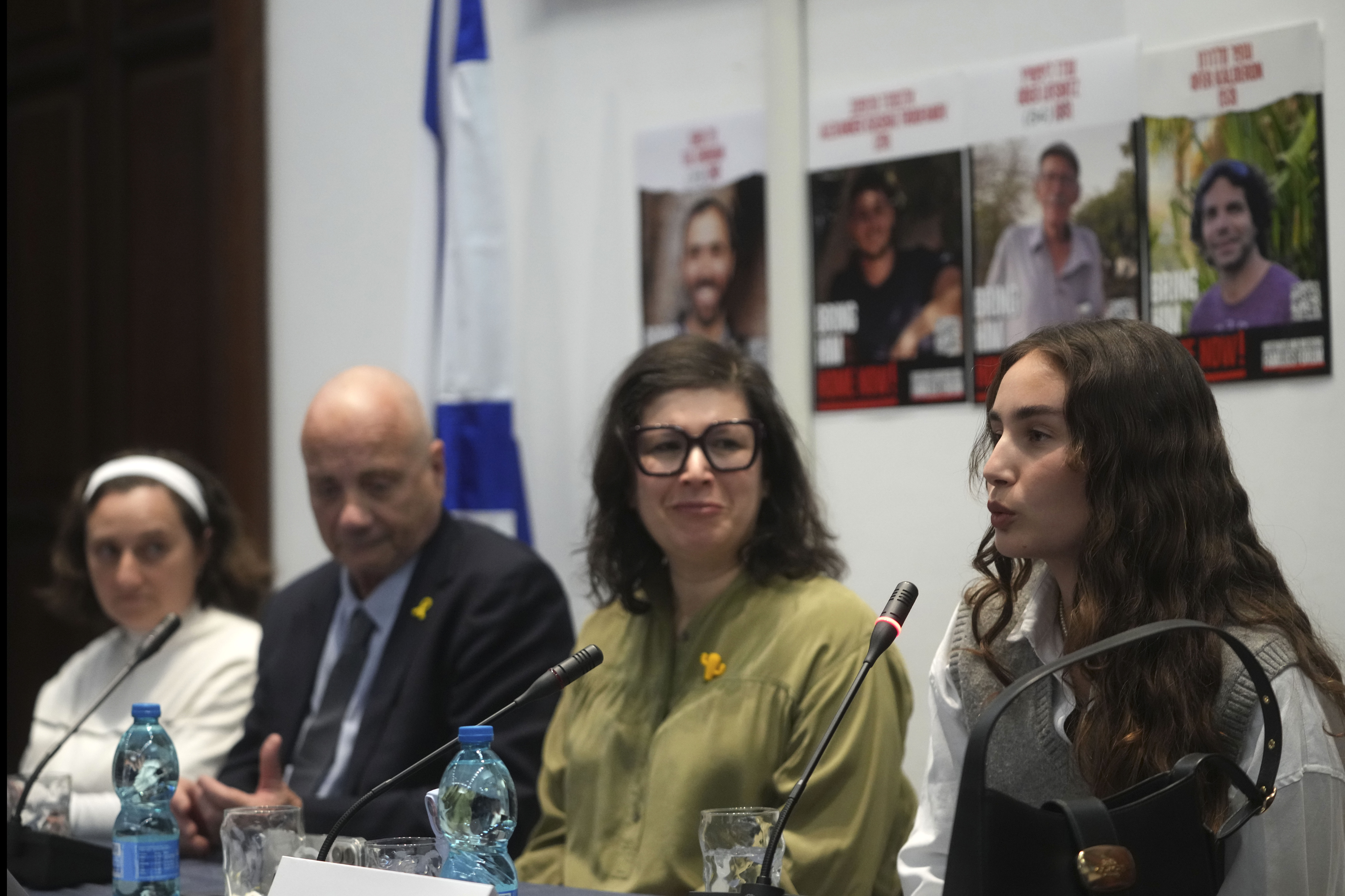 From left, Elena Troufanov, Louis Har, Sharon Lifschitz, and Gaya Kalderon former Israeli hostages and relatives of some still being held by Hamas attend a press conference in Rome, Thursday, Nov. 14, 2024. (AP Photo/Alessandra Tarantino)