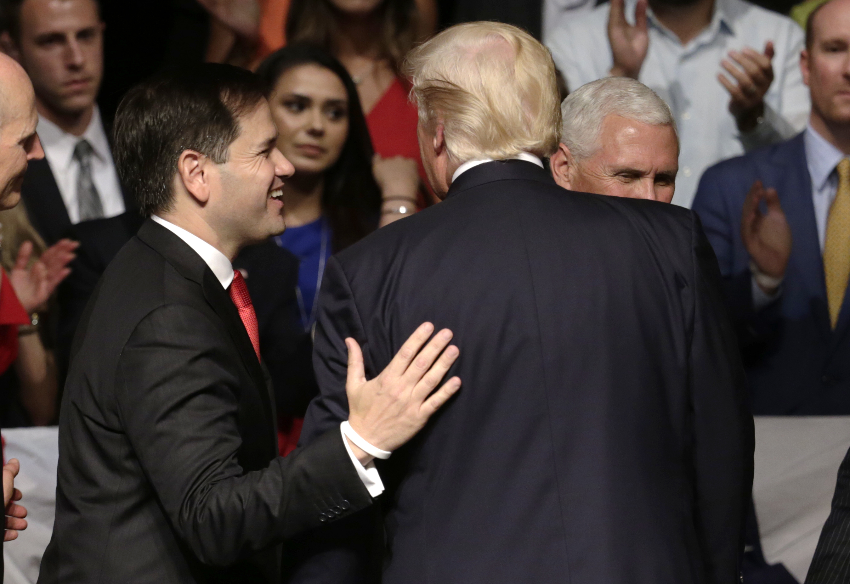 FILE - Sen. Marco Rubio, R-Fla., walks off the stage with President Donald Trump after a speech where Trump revised a Cuba policy, in Miami, June 16, 2017. (AP Photo/Lynne Sladky, File)