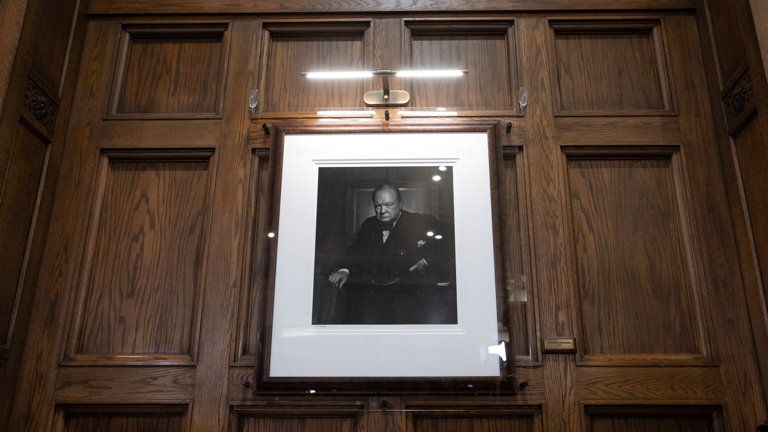 Yousuf Karsh's 1941 portrait of Winston Churchill, which he gifted to the Fairmont Chateau Laurier, is seen after being unveiled at the hotel following its theft and return, Friday, Nov. 15, 2024 in Ottawa, Ontario. (Adrian Wyld/The Canadian Press via AP)