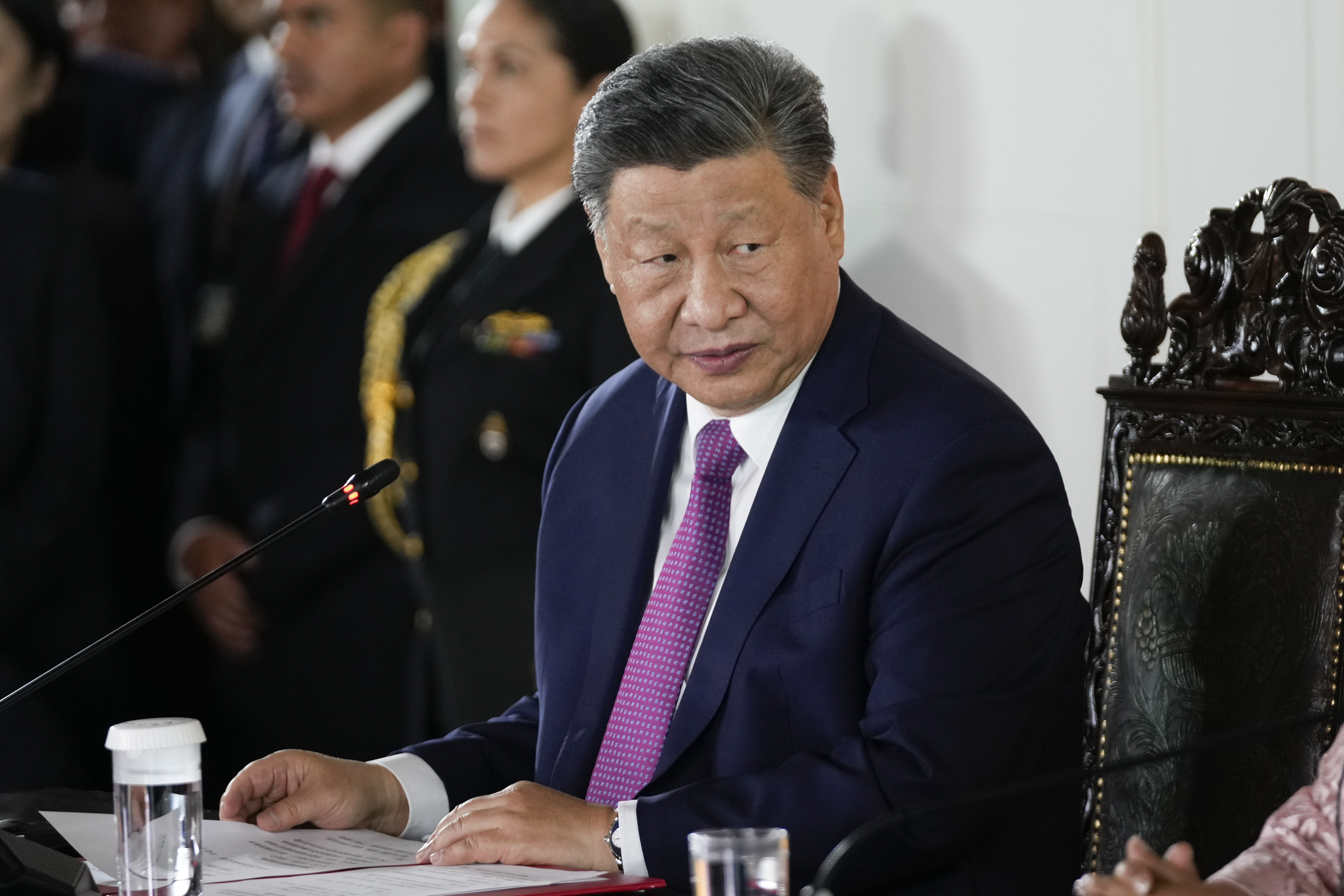 Chinese President Xi Jinping looks on during a ceremony to virtually inaugurate a Chinese-funded port in the city of Chancay, at the government palace in Lima, Peru, Thursday, Nov. 14, 2024. (AP Photo/Fernando Vergara)