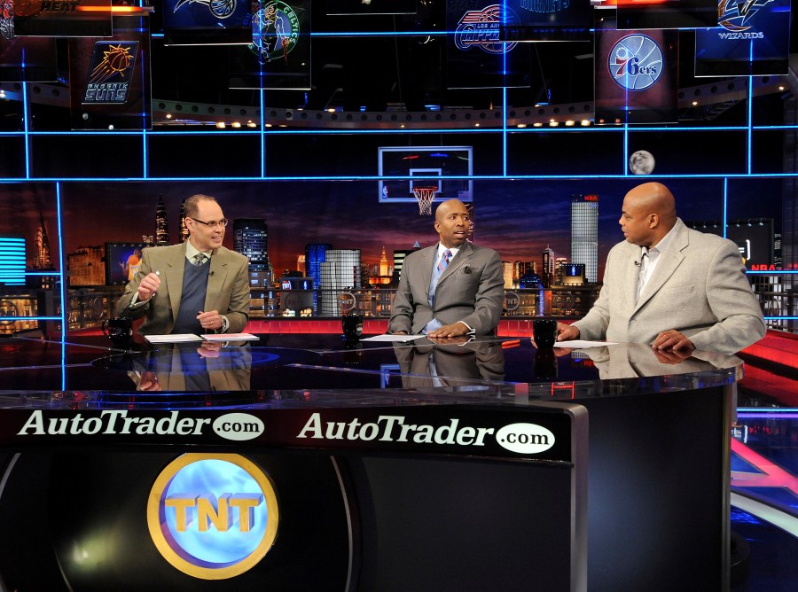 FILE - Inside the NBA host Ernie Johnson Jr., left, and analysts Kenny Smith, center, and Charles Barkley speak on the set at the TNT studios in Atlanta, Feb. 4, 2010. (AP Photo/Erik S. Lesser, File)