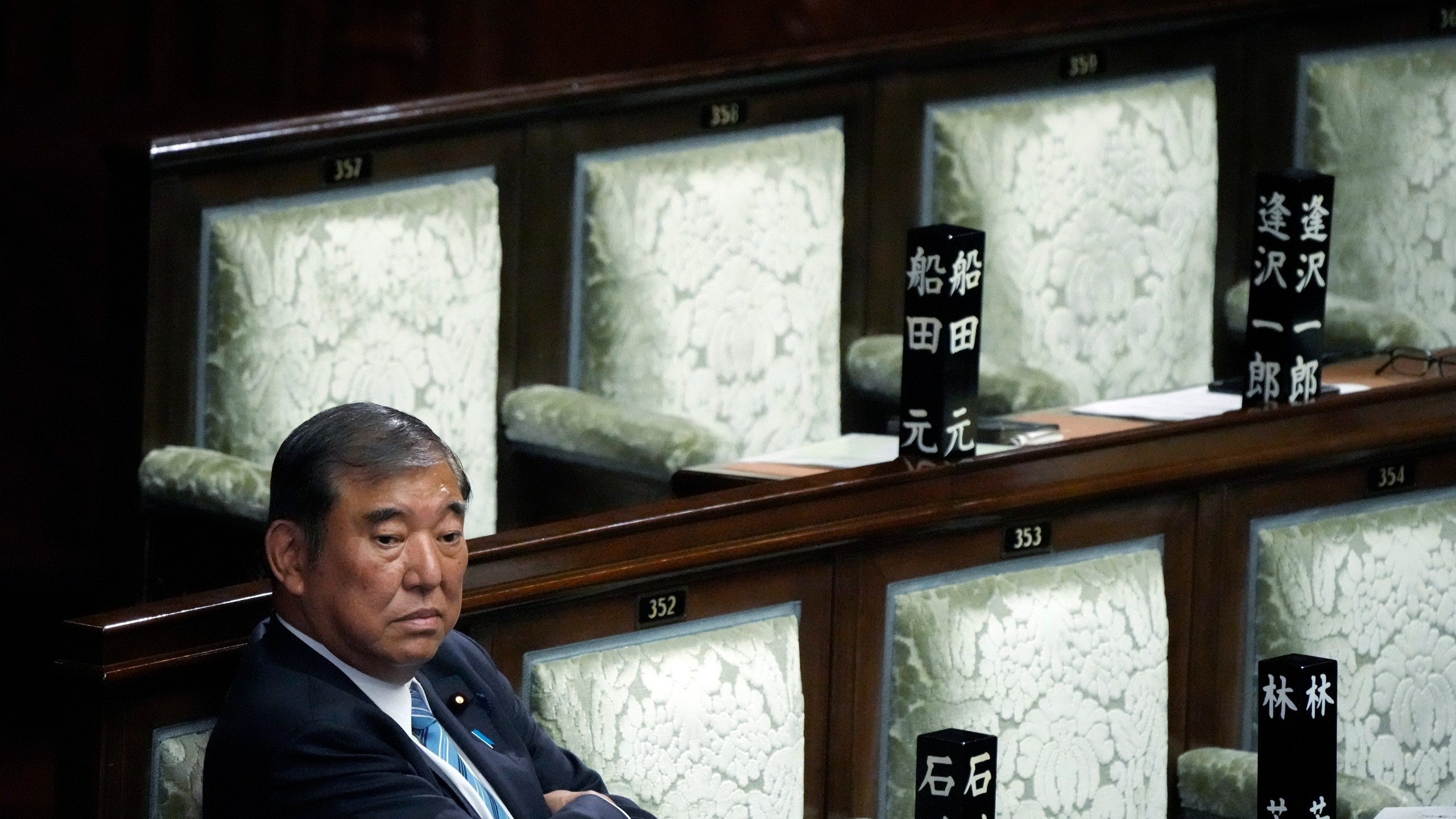 FILE - Japanese Prime Minister Shigeru Ishiba waits after the first vote for a new prime minister at a special parliamentary session of the lower house Monday, Nov. 11, 2024, in Tokyo. (AP Photo/Eugene Hoshiko, file)