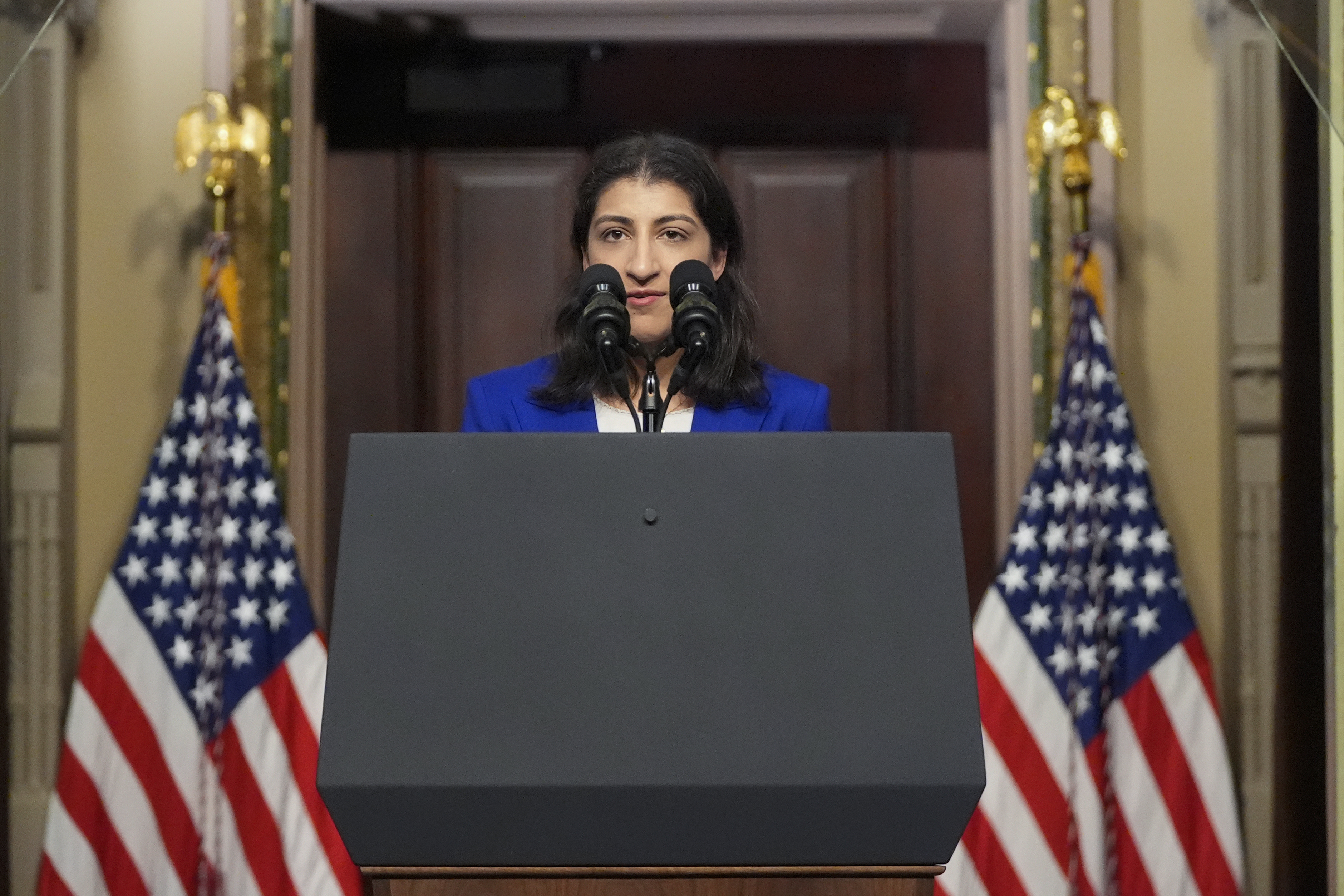 FILE - Lina Khan talks about health care costs at the Eisenhower Executive Office Building on the White House complex in Washington, April 3, 2024. (AP Photo/Mark Schiefelbein, File)