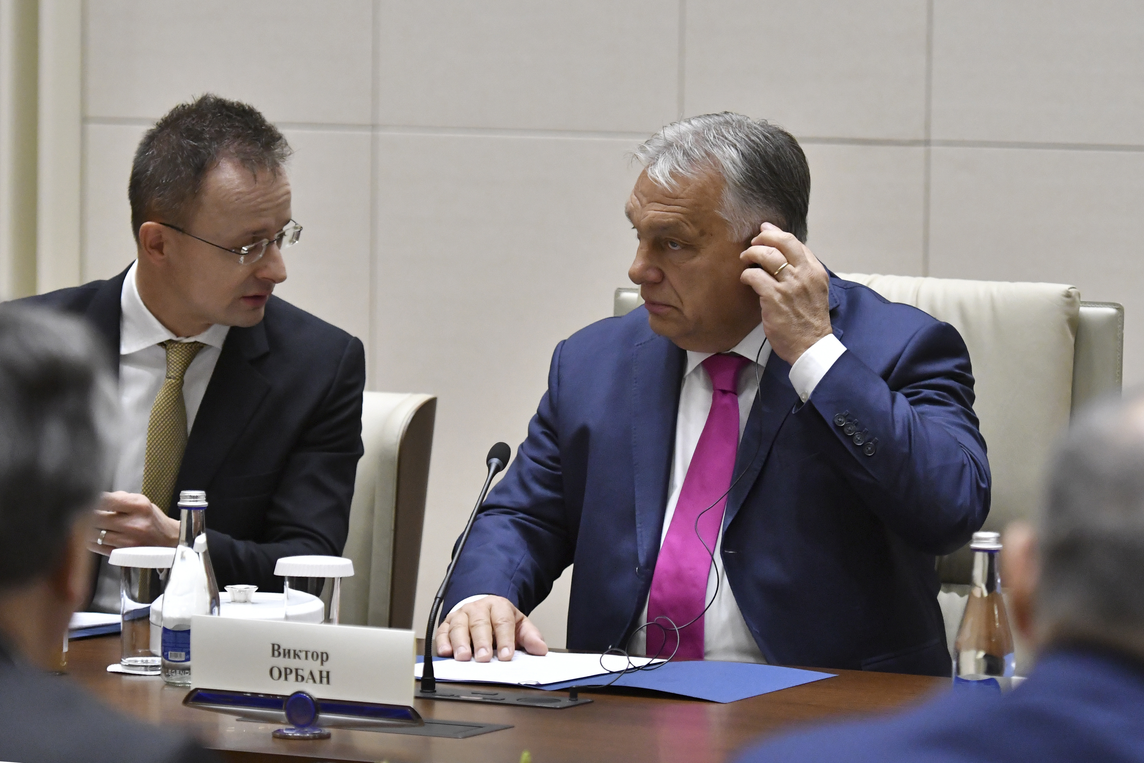 Hungarian Foreign Minister Peter Szijjarto, rear left, and Hungarian Prime Minister Viktor Orban, rear right, attend a meeting with Kyrgyz President Sadyr Japarov at Yntymak Ordo State Residence in Bishkek, Kyrgyzstan, Tuesday, Nov. 5, 2024. (AP Photo/Vladimir Voronin)