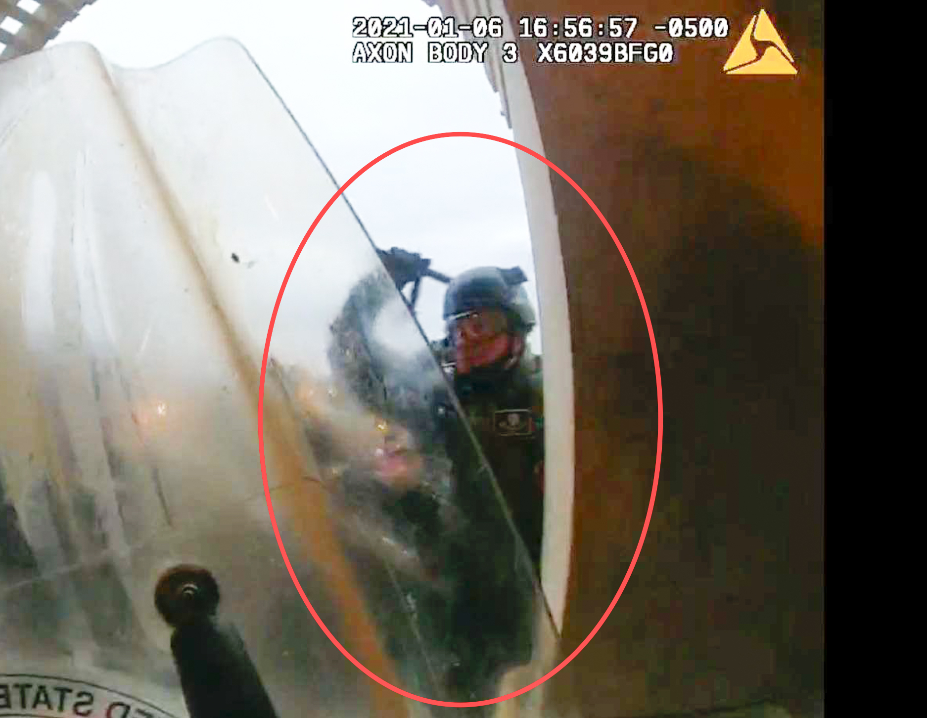 This image from police body-worn camera video, contained and annotated in the Justice Department's statement of facts, supporting the arrest warrant for Edward Richmond Jr., at the U.S. Capitol on Jan. 6, 2021, in Washington. (Department of Justice via AP)