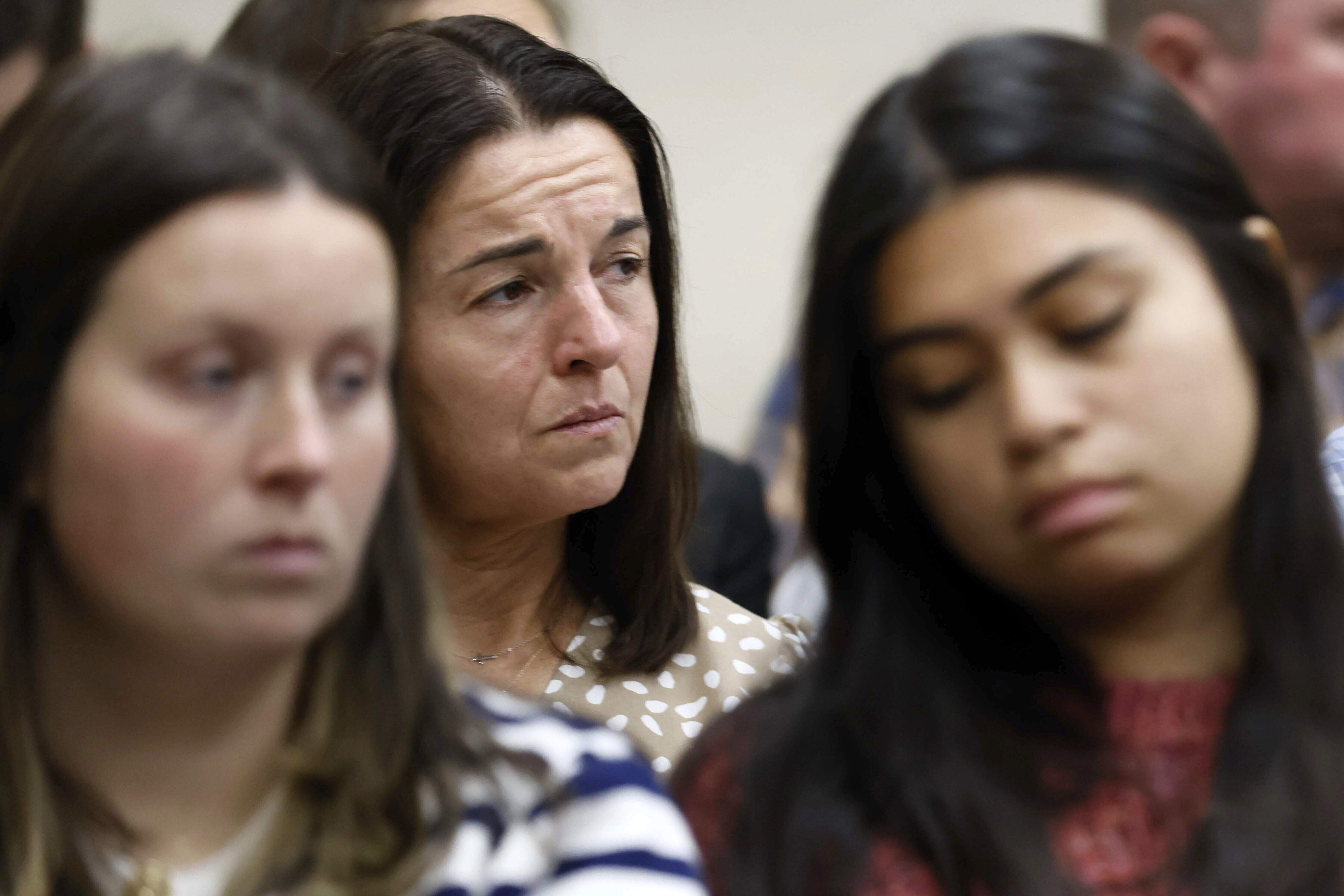 Allyson Phillips, mother of Laken Riley, second left, listens during the trial of Jose Ibarra at Athens-Clarke County Superior Court on Monday, Nov. 18, 2024, in Athens, Ga. (Miguel Martinez/Atlanta Journal-Constitution via AP, Pool)