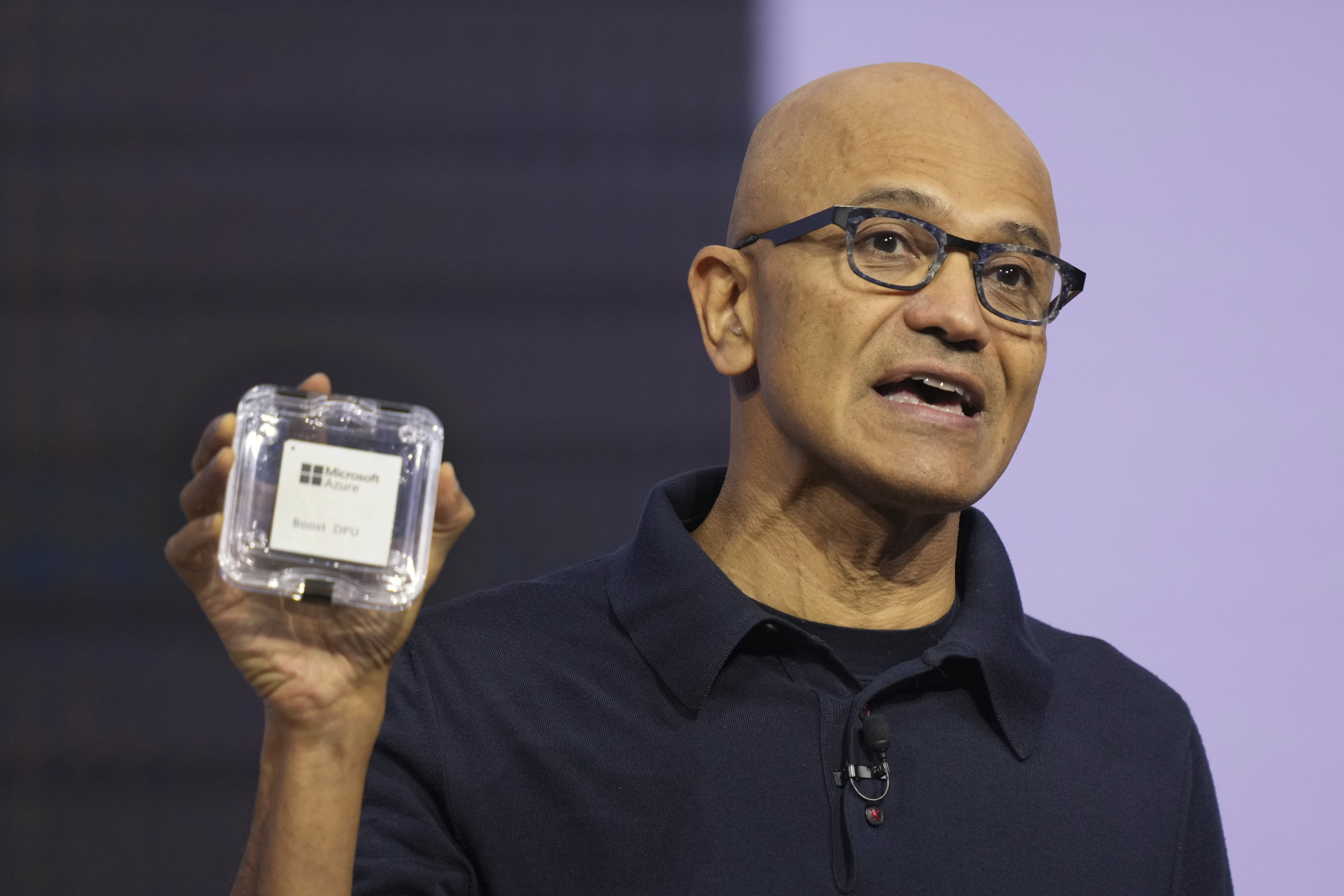 Microsoft CEO Satya Nadella introduces the Azure Boost DPU at the company's Ignite conference Tuesday, Nov. 19, 2024, in Chicago. (AP Photo/Charles Rex Arbogast)