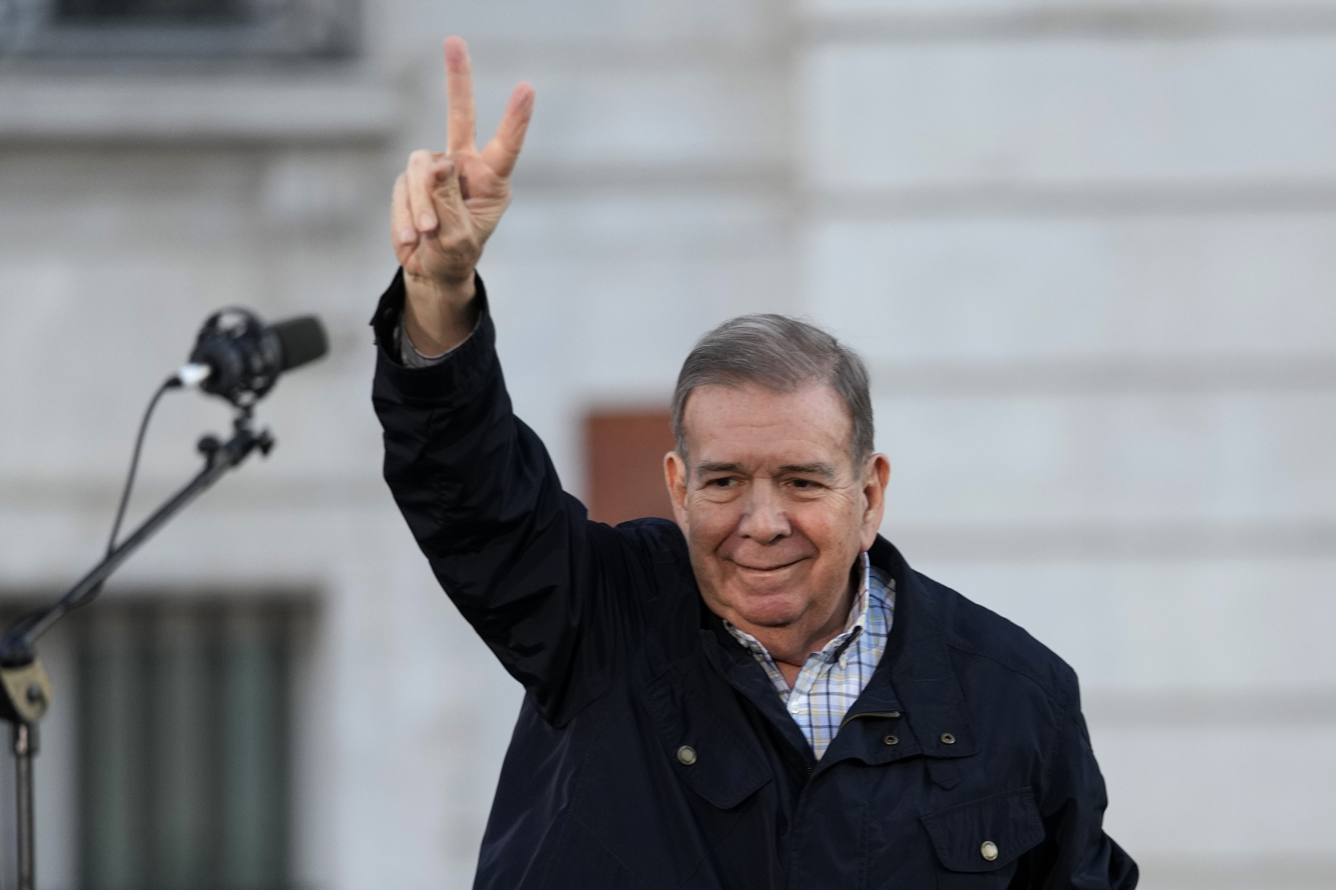 FILE - Venezuelan opposition leader Edmundo González waves to supporters at Puerta del Sol in downtown Madrid, Spain, Sept. 28, 2024. (AP Photo/Bernat Armangue, File)