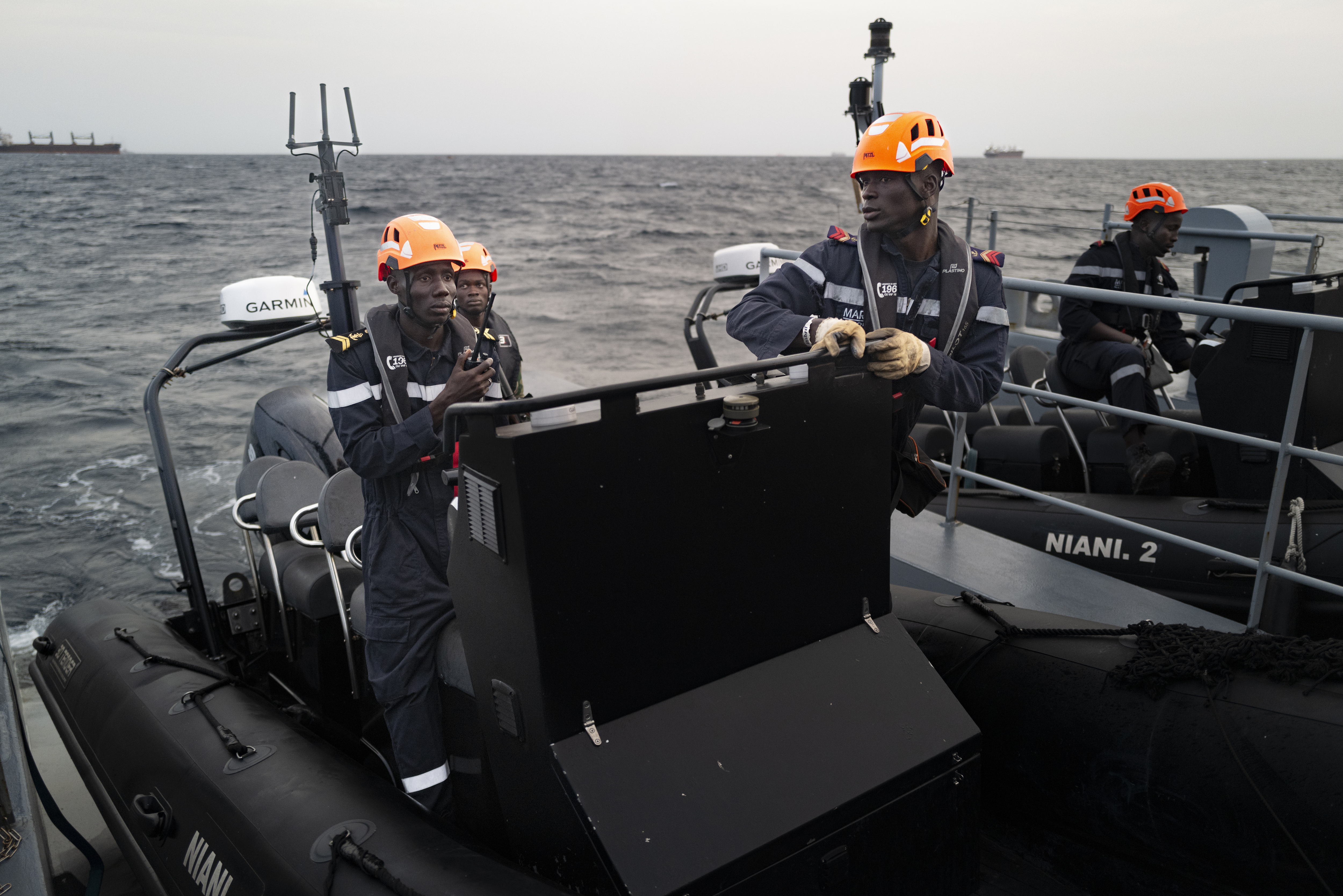 Senegalese sailors prepare their zodiacs during a mission to search for migrant boats near the coast of Dakar, Senegal, Saturday, Nov.16, 2024. (AP Photo/Sylvain Cherkaoui)