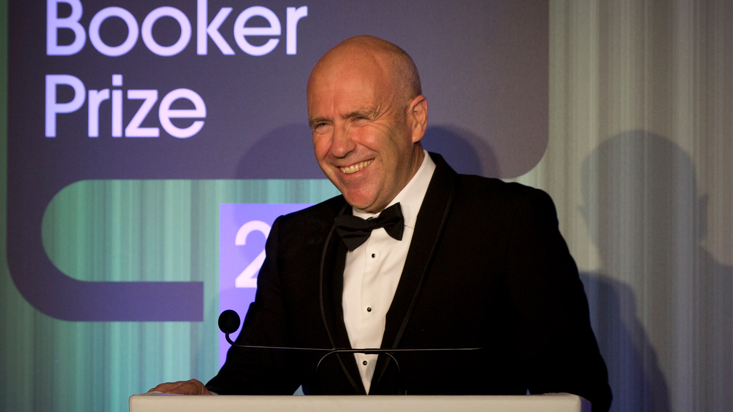 FILE - Winner of the Man Booker for fiction 2014 Australian author Richard Flanagan, author of 'The Narrow Road to the Deep North', speaks after winning the prize at the Guildhall in London, Oct. 14, 2014. (AP Photo/Alastair Grant, Pool, File)