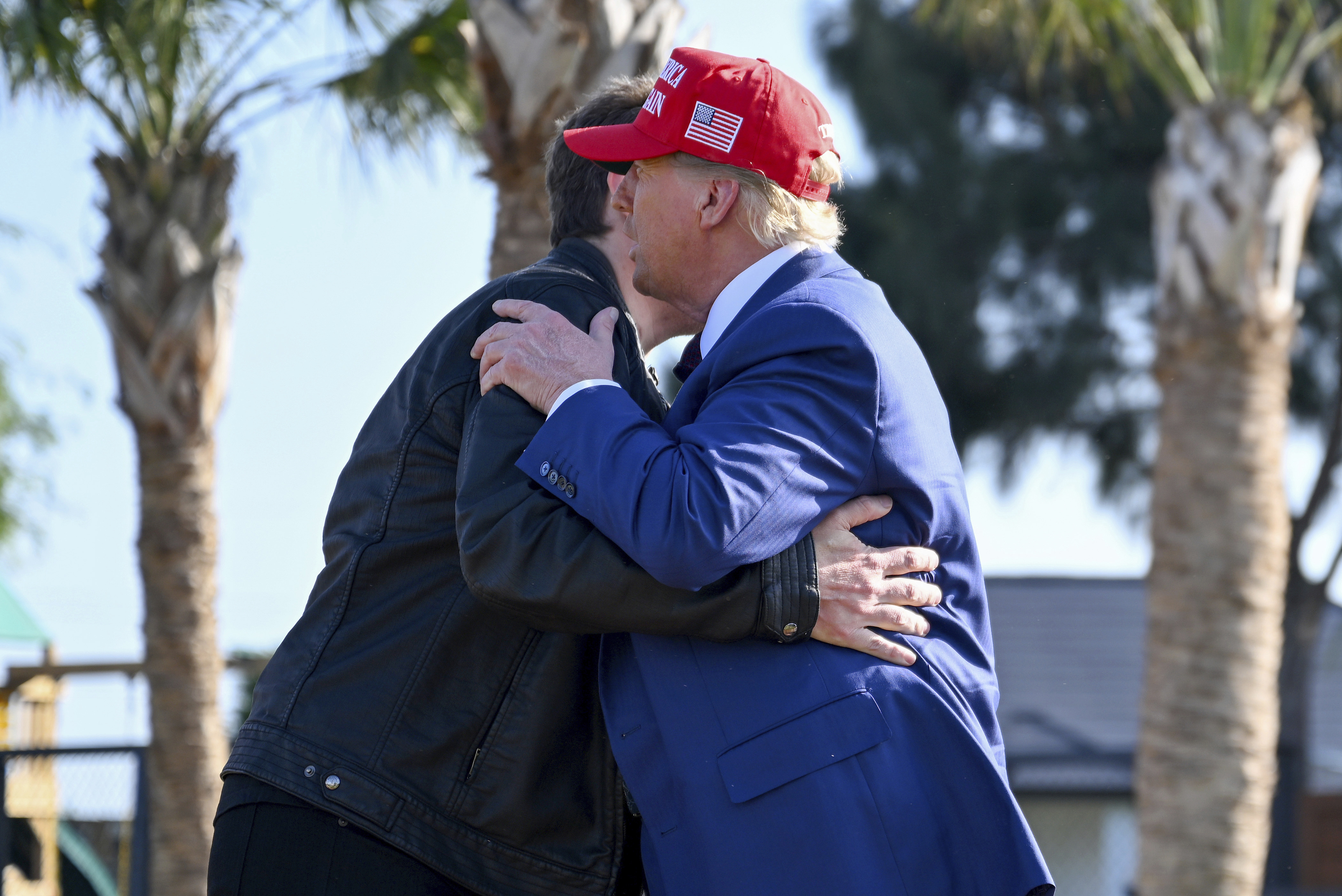 President-elect Donald Trump greets Elon Musk before the launch of the sixth test flight of the SpaceX Starship rocket Tuesday, Nov. 19, 2024 in Boca Chica, Texas. (Brandon Bell/Pool via AP)