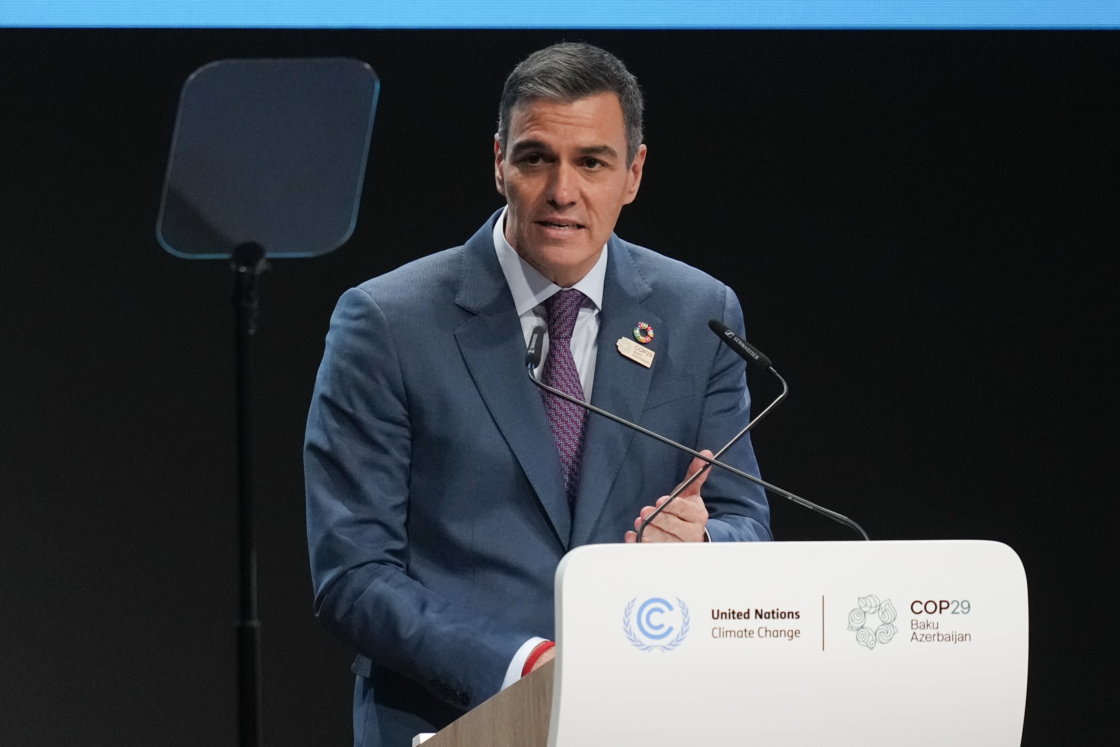 Spain President Pedro Sanchez speaks during a plenary session during a plenary session at the COP29 U.N. Climate Summit, Tuesday, Nov. 12, 2024, in Baku, Azerbaijan. (AP Photo/Rafiq Maqbool)