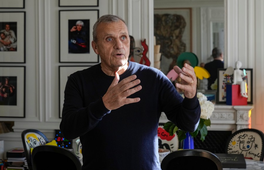 Designer Jean-Charles de Castelbajac gestures as he speaks during an interview with the Associated Press Wednesday, Nov. 20, 2024 in Paris. (AP Photo/Michel Euler)