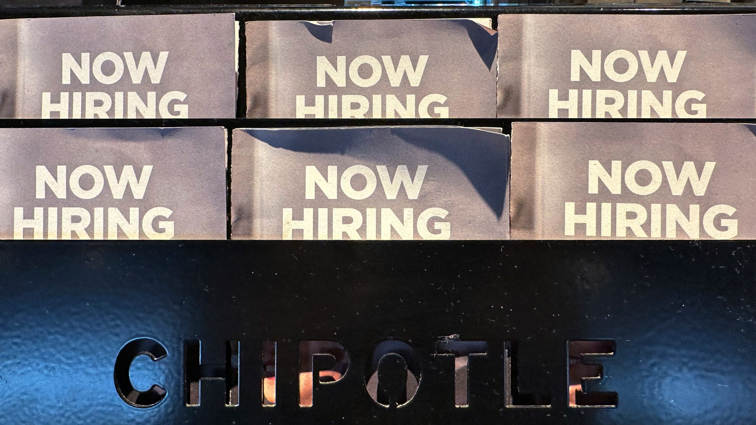 FILE - Hiring signs are displayed at a restaurant in Buffalo Grove, Ill., on Nov. 3, 2024. (AP Photo/Nam Y. Huh, File)