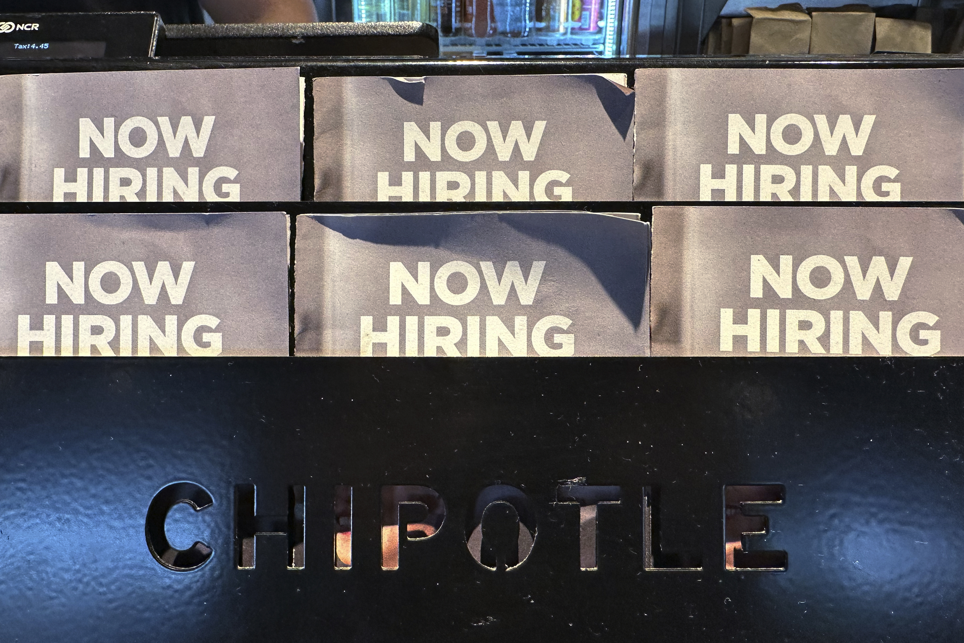 FILE - Hiring signs are displayed at a restaurant in Buffalo Grove, Ill., on Nov. 3, 2024. (AP Photo/Nam Y. Huh, File)