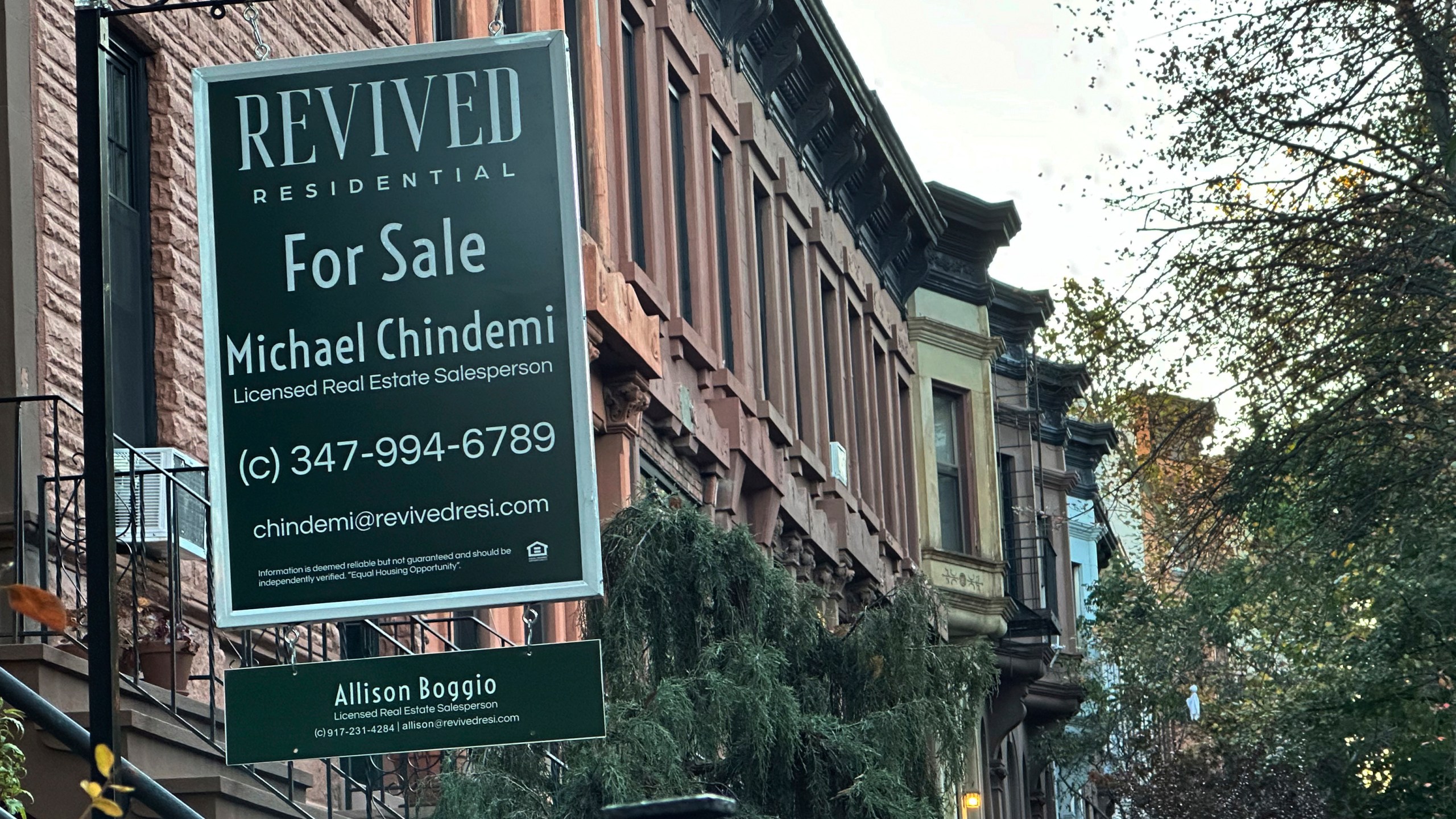 FILE - A for sale sign hangs outside a home in the Brooklyn borough of New York on Nov. 13, 2024. (AP Photo/Peter Morgan, File)