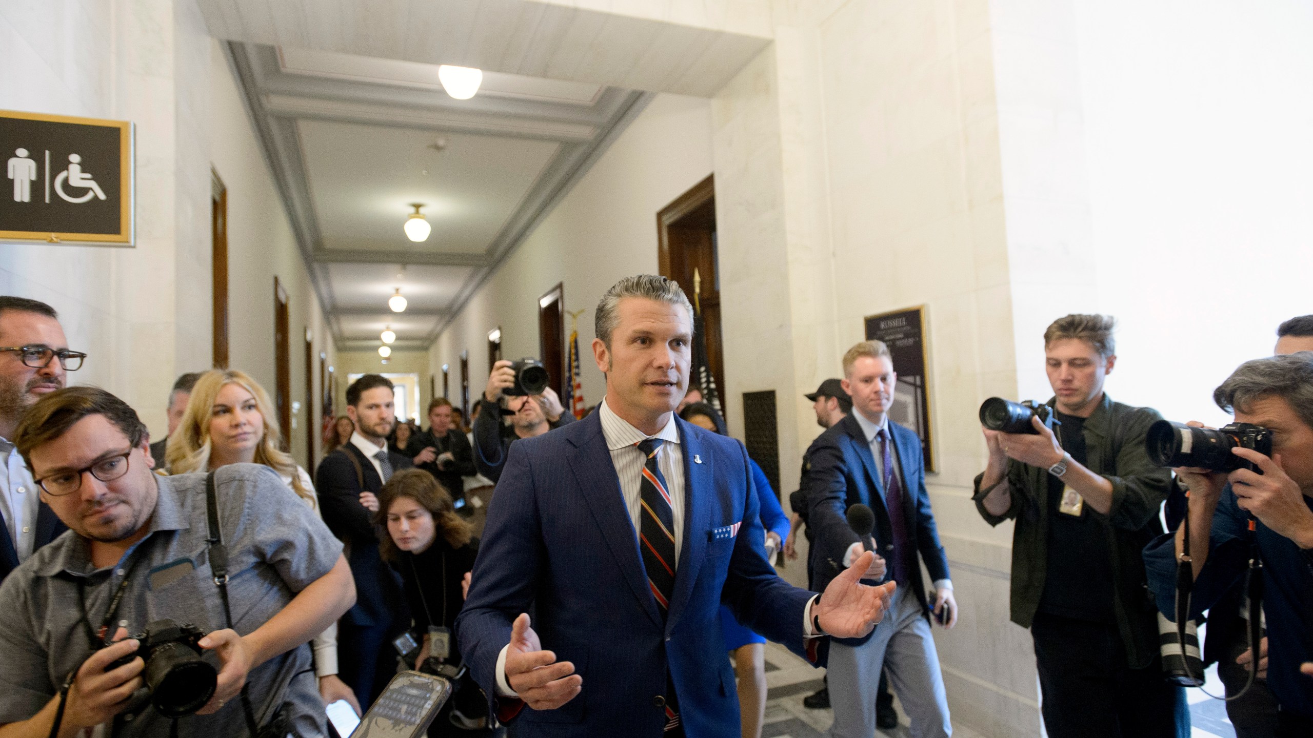 Pete Hegseth, President-elect Donald Trump's pick for secretary of defense, speaks with reporters following a meeting with senators on Capitol Hill, Thursday, Nov. 21, 2024, in Washington. (AP Photo/Rod Lamkey, Jr.)