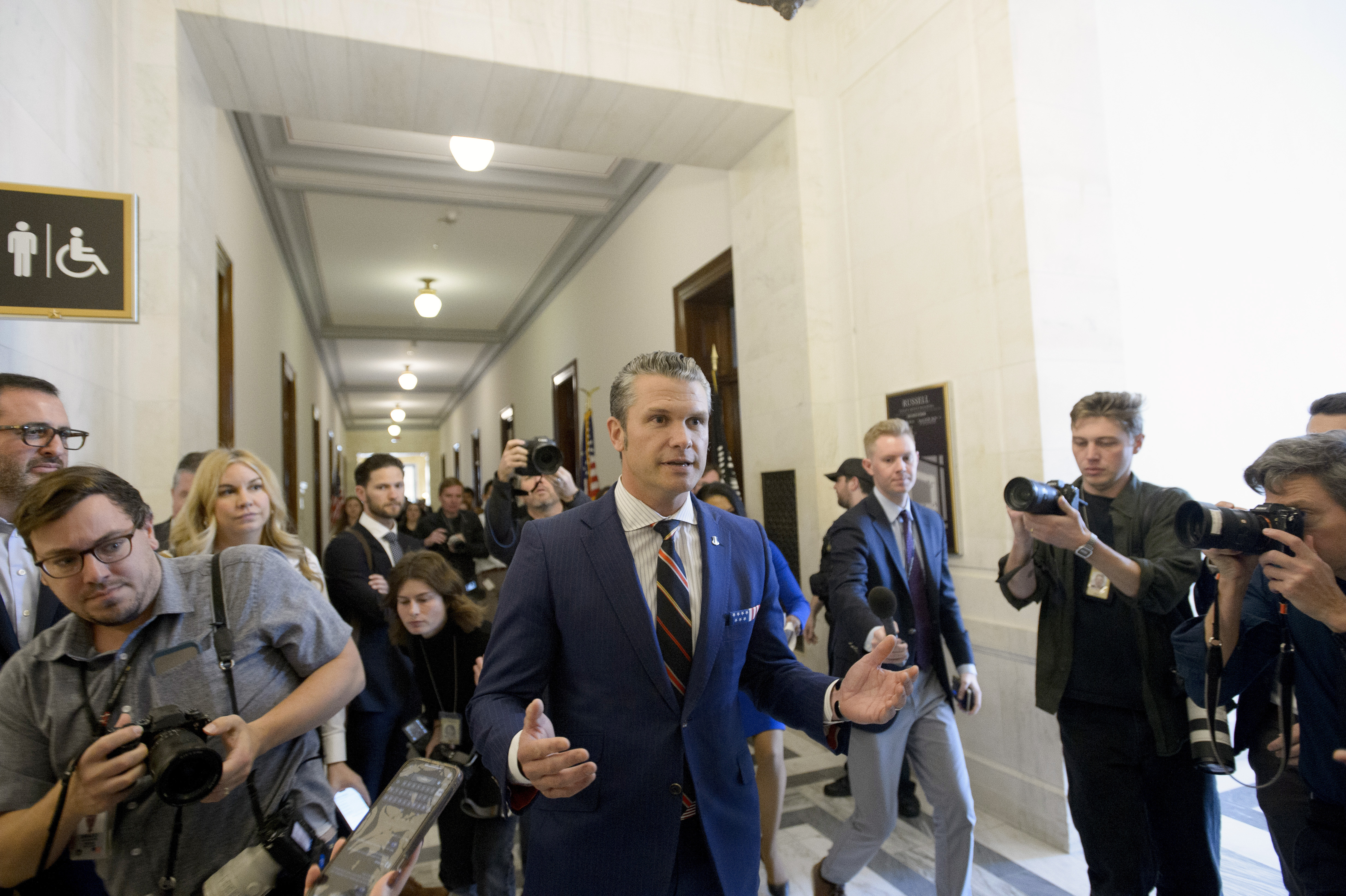 Pete Hegseth, President-elect Donald Trump's pick for secretary of defense, speaks with reporters following a meeting with senators on Capitol Hill, Thursday, Nov. 21, 2024, in Washington. (AP Photo/Rod Lamkey, Jr.)