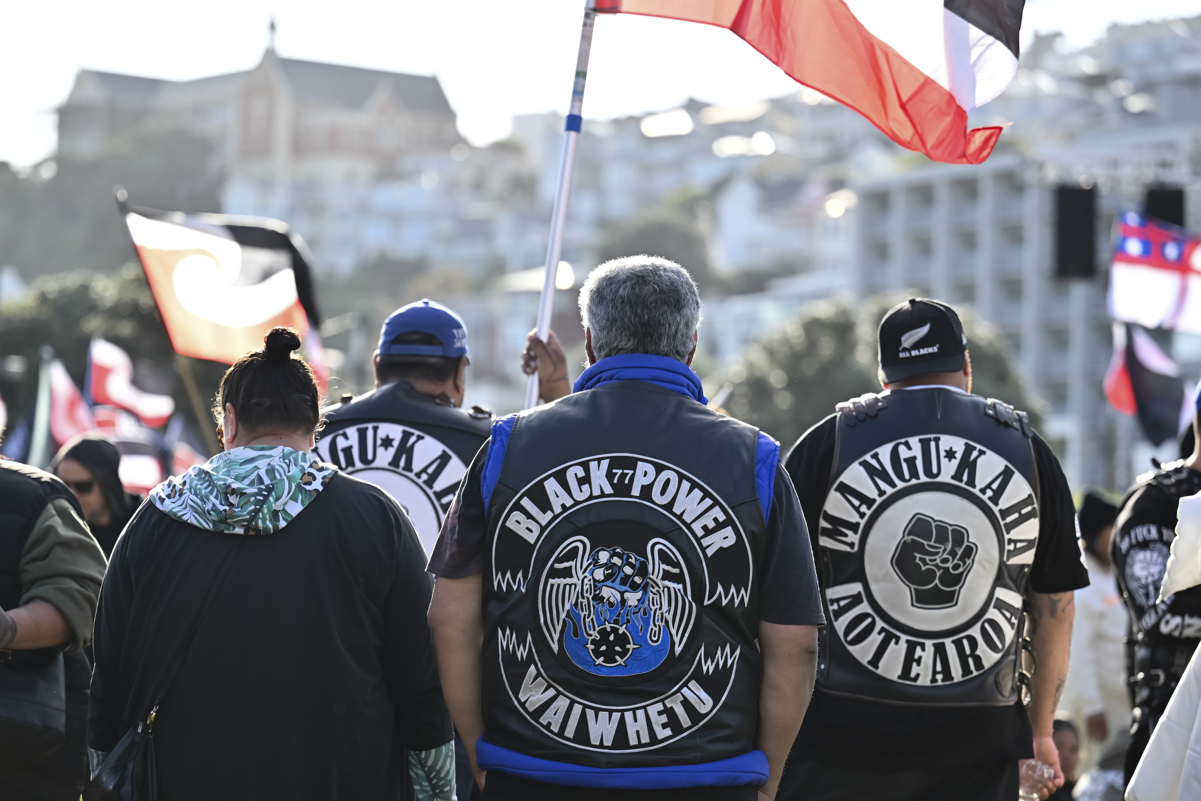 Members of patched gangs gather before marching to parliament during a protest against a proposed law that would redefine the country's founding agreement between Indigenous Māori and the British Crown, in Wellington, New Zealand, Tuesday, Nov. 19, 2024. (AP Photo/Mark Tantrum)