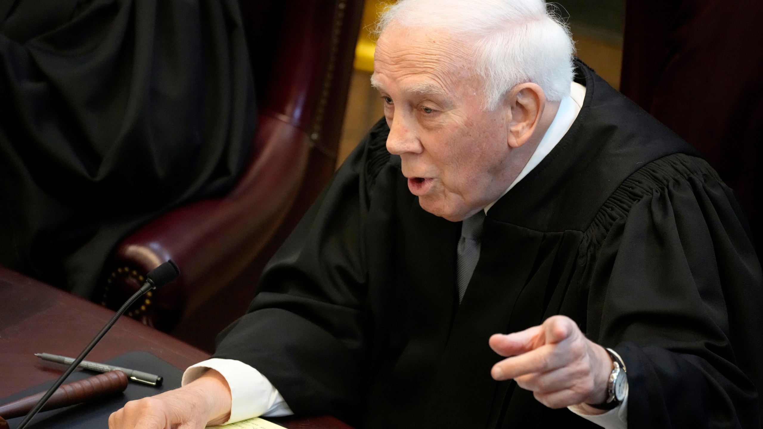 FILE - Mississippi Supreme Court Presiding Justice James W. Kitchens asks a question, July 6, 2023, before the court in Jackson, Miss. (AP Photo/Rogelio V. Solis, File)