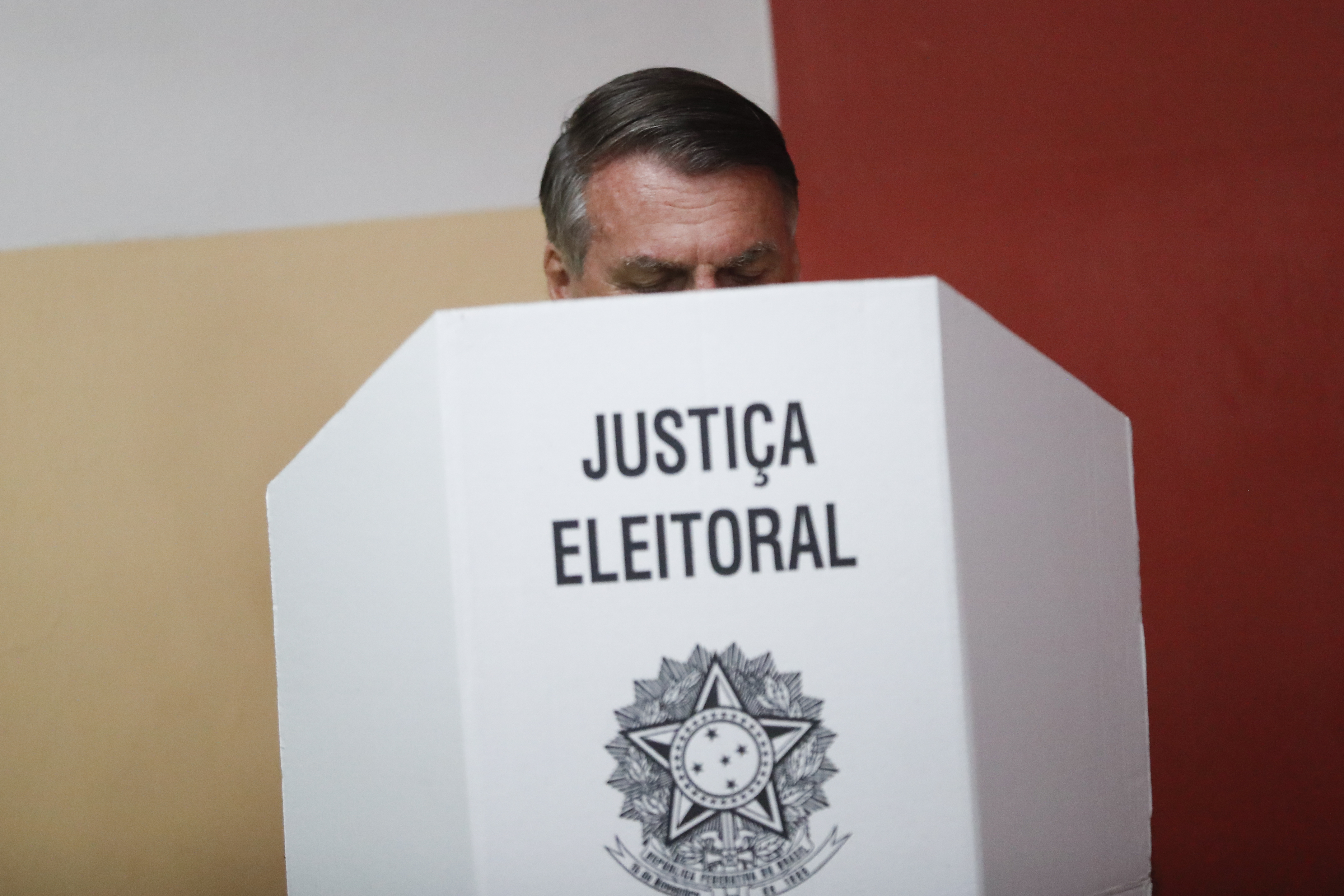 FILE - Brazilian President Jair Bolsonaro votes in the run-off presidential election as he runs for another term in Rio de Janeiro, Brazil, Oct. 30, 2022. (AP Photo/Bruna Prado, Pool, File)