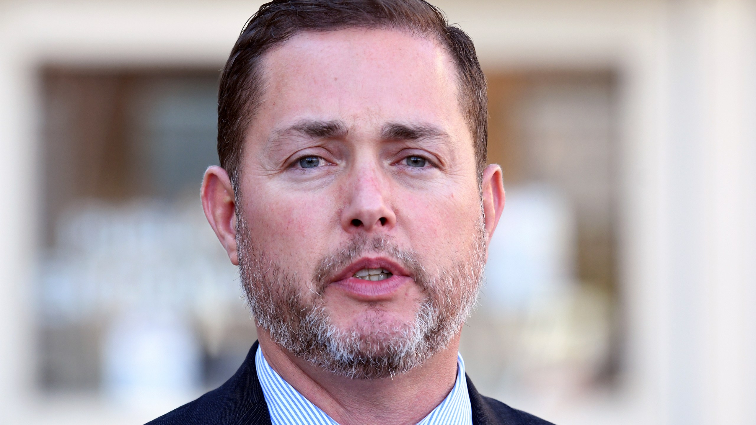 District Attorney Michael Allen speaks during a news conference after owners of a Colorado funeral home who let nearly 190 bodies decay pleaded guilty to corpse abuse in Colorado Springs, Colo., on Friday, Nov. 22, 2024. (AP Photo/Thomas Peipert)