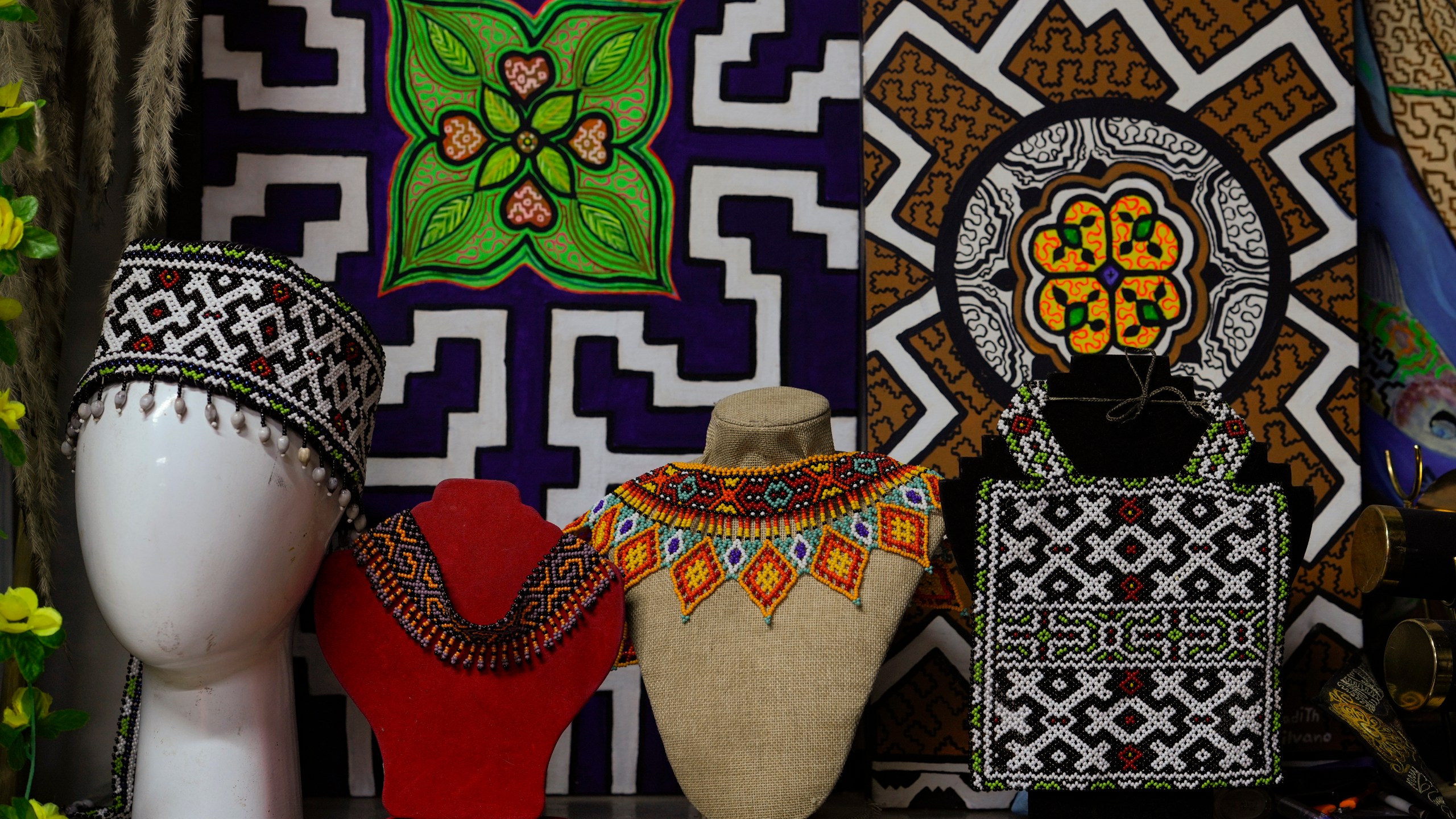 Crafts made by Sadith Silvano sit at her home and workshop in Lima, Peru, Saturday, Oct. 19, 2024. “Every design tells a story,” said Silvano, from Paoyhan, a Shipibo-Konibo Indigenous community in the Amazon. (AP Photo/Guadalupe Pardo)