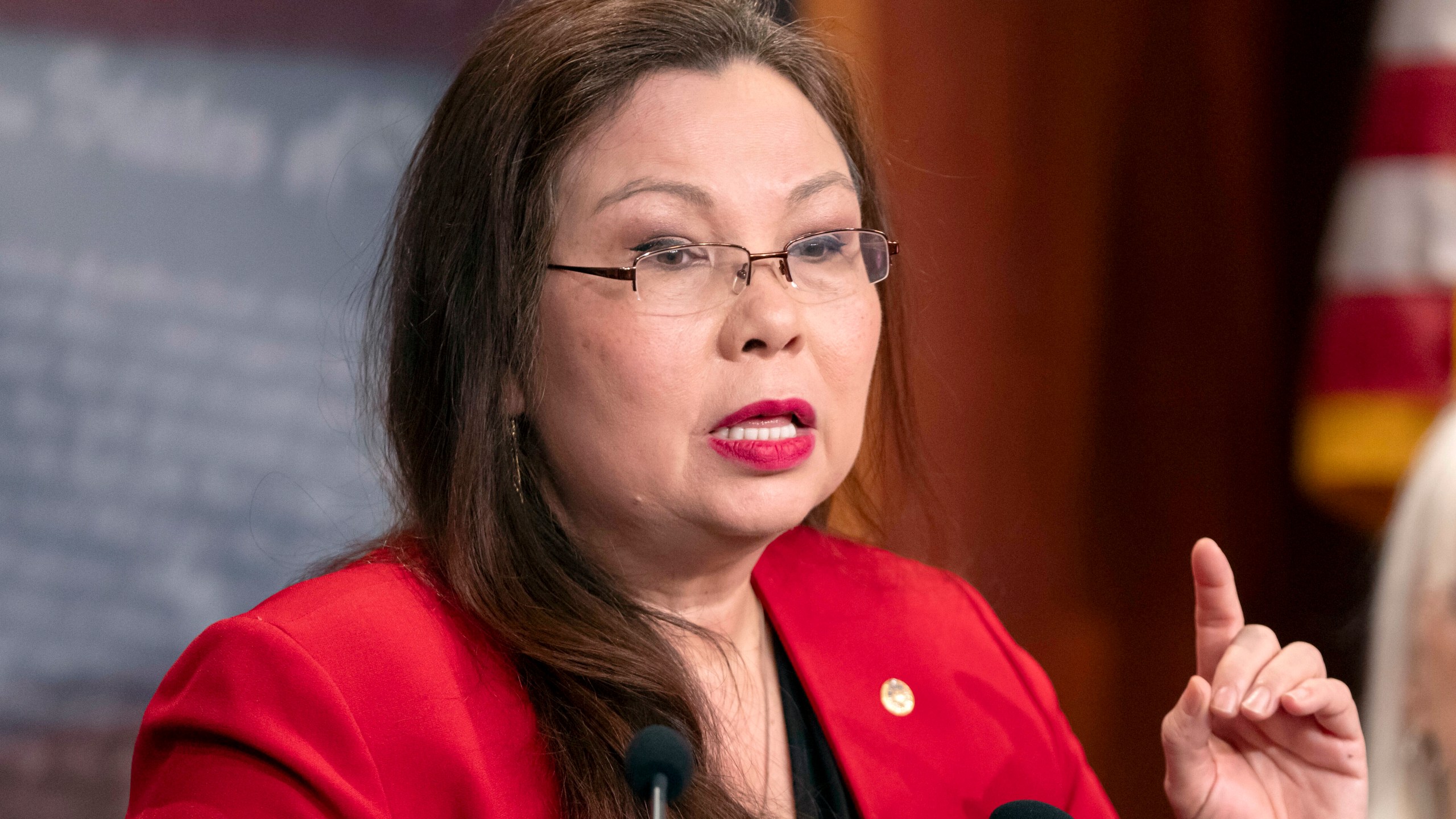 FILE - Sen. Tammy Duckworth, D-Ill., speaks during a press event on Capitol Hill, Feb. 27, 2024, in Washington. (AP Photo/Mark Schiefelbein, File)