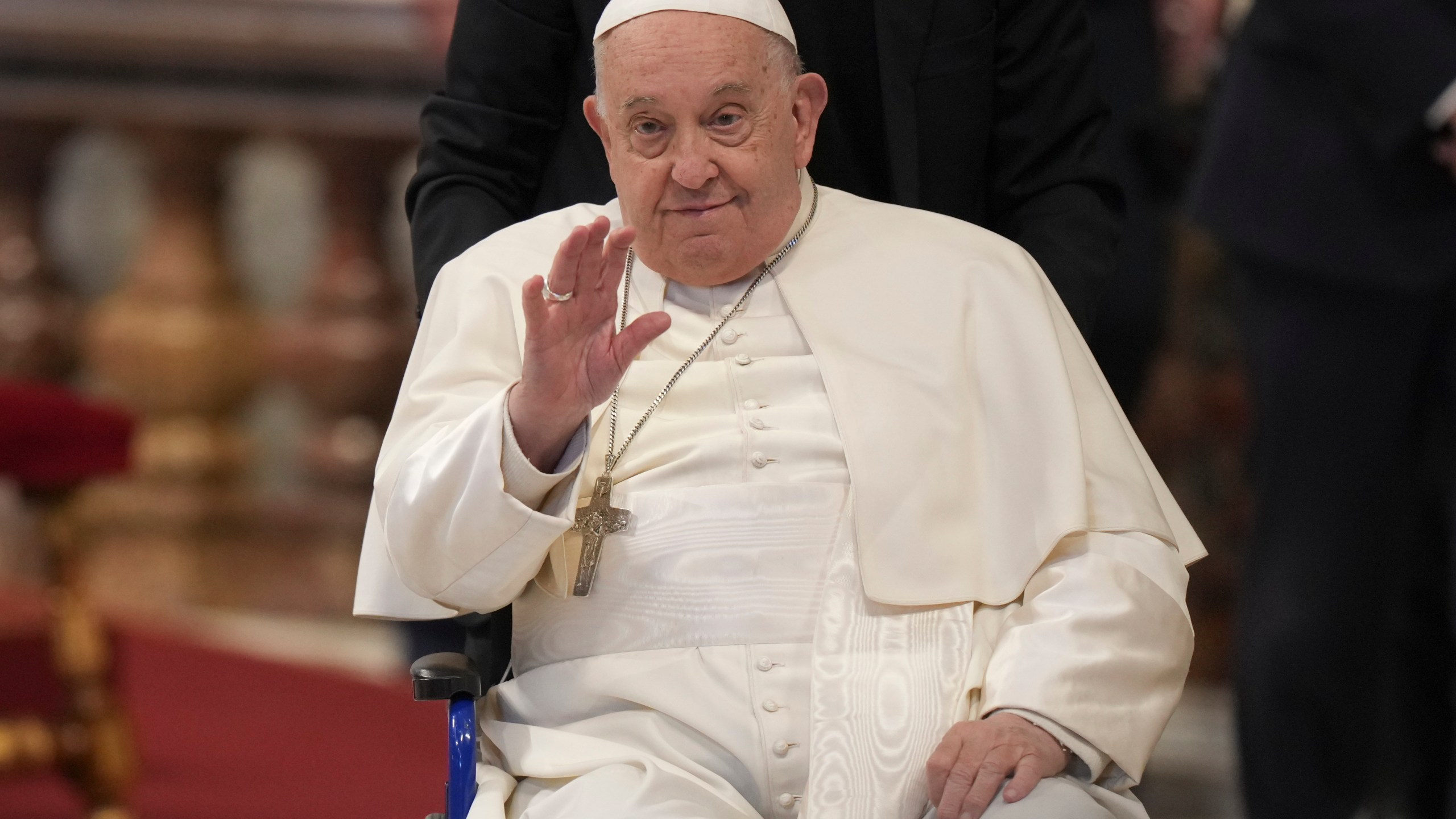 Pope Francis leaves after he presided over a mass on the occasion of the Youth Day, in St. Peter's Basilica at the Vatican, Sunday, Nov. 24, 2024. (AP Photo/Andrew Medichini)