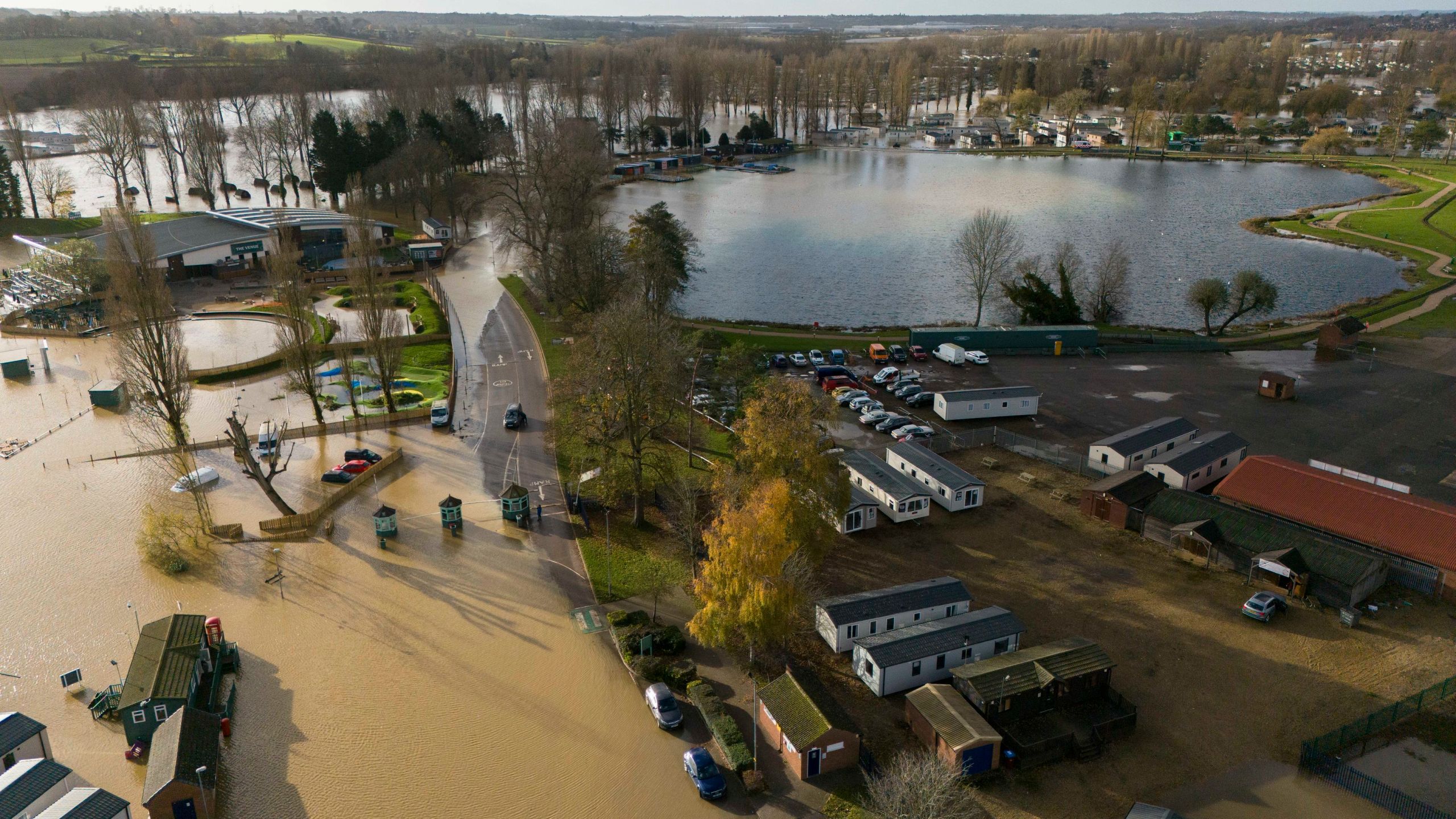 Floodwater covers parts of the Billing Aquadrome in Northamptonshire, England, Monday Nov. 25, 2024, after Storm Bert caused "devastating" flooding over the weekend. (Jordan Pettitt/PA via AP)