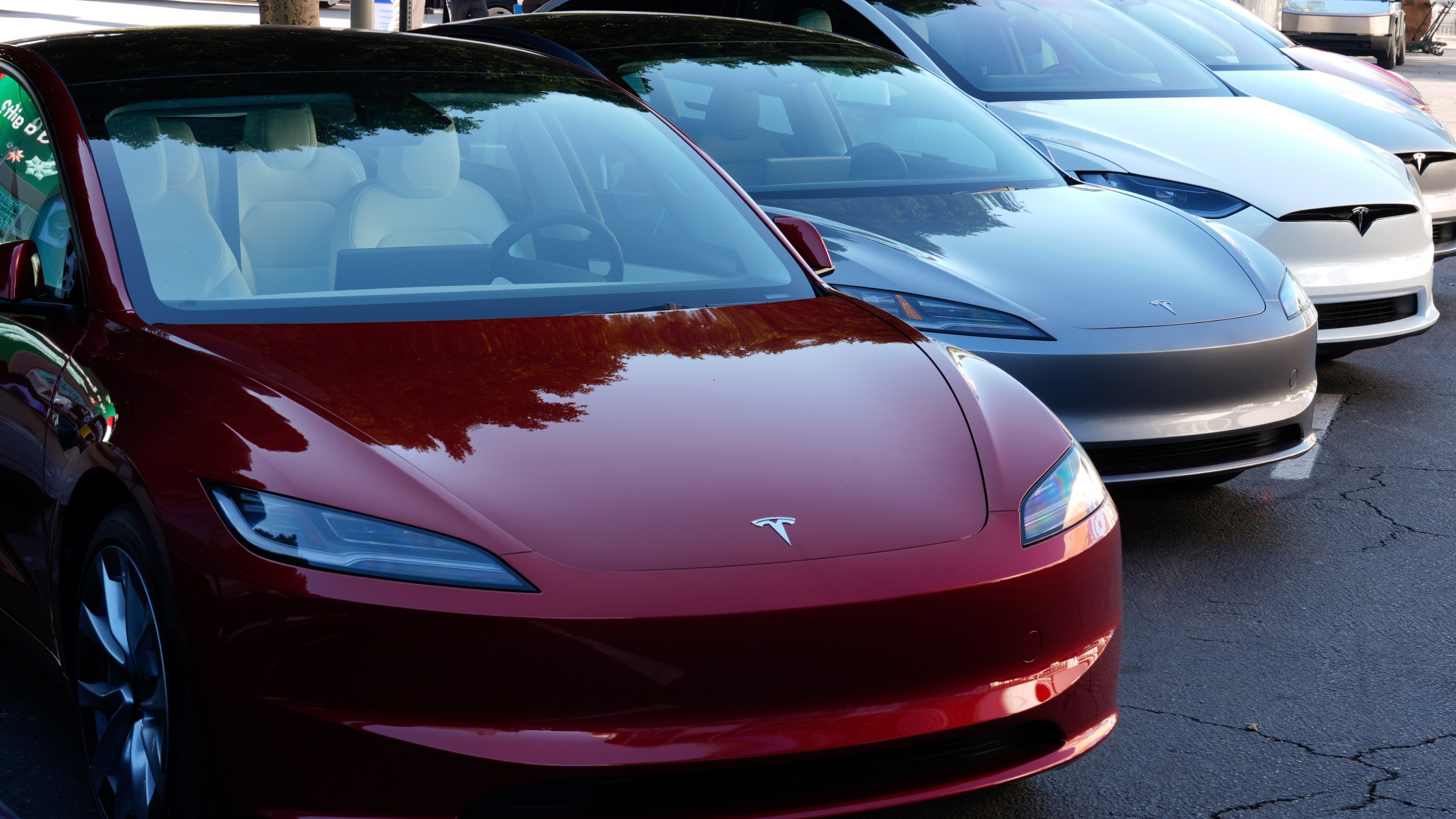 FILE - Tesla vehicles are displayed at the AutoMobility LA Auto Show,Thursday, Nov. 21, 2024, in Los Angeles. (AP Photo/Damian Dovarganes, File)