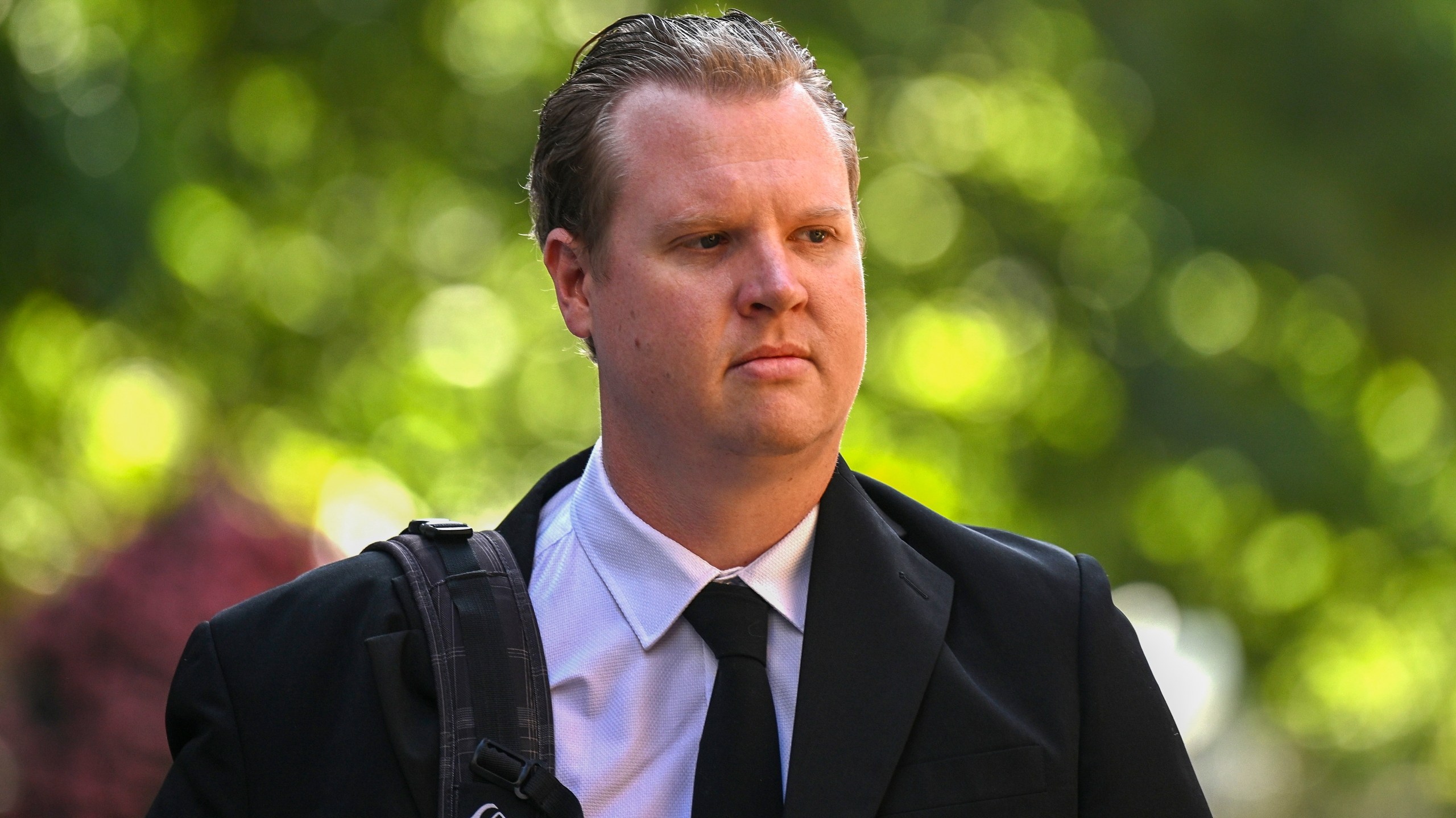 Senior Constable Kristian White arrives at the New South Wales Supreme Court, in Sydney, Tuesday, Nov. 26, 2024. (Dan Himbrechts/AAP Image via AP)