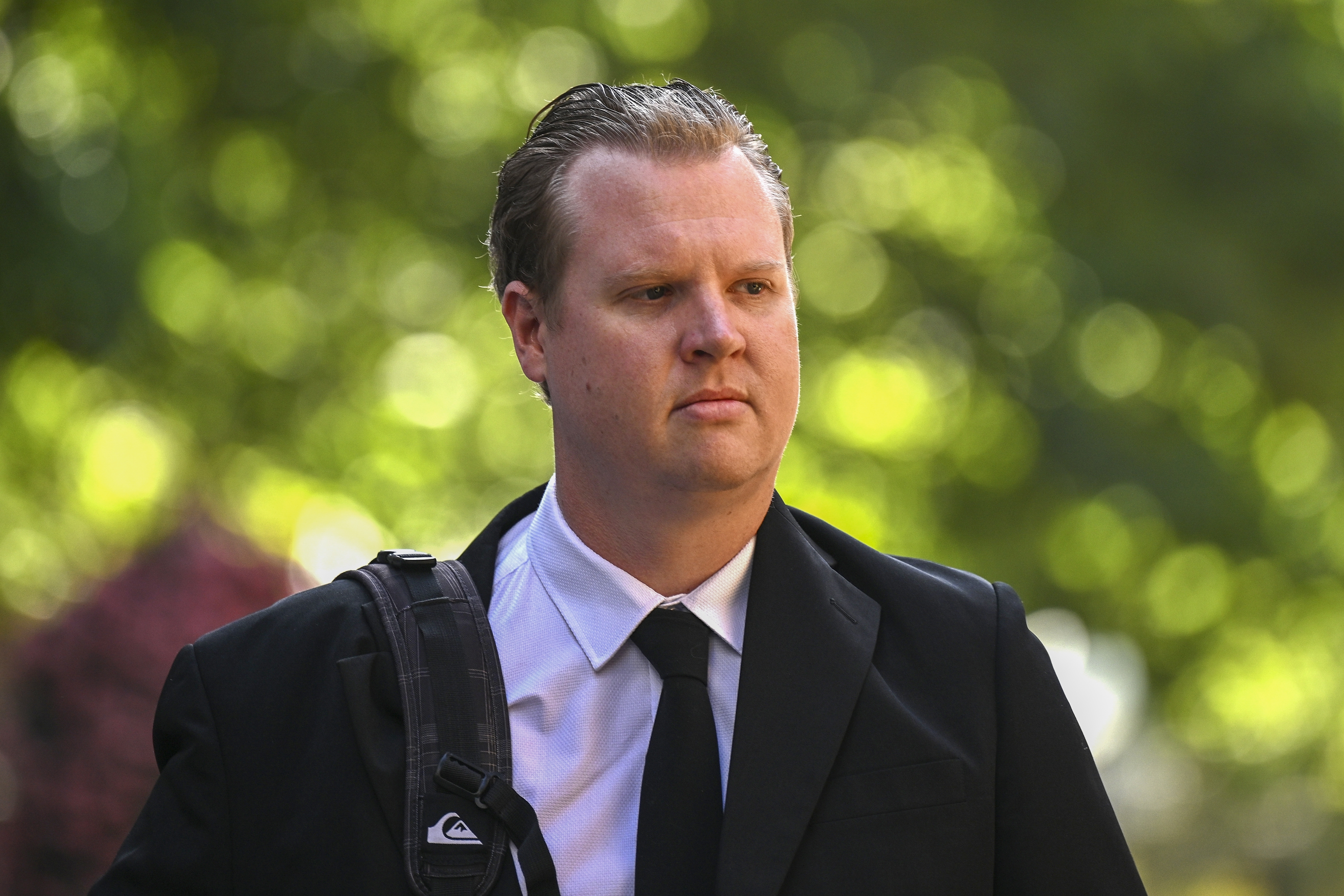 Senior Constable Kristian White arrives at the New South Wales Supreme Court, in Sydney, Tuesday, Nov. 26, 2024. (Dan Himbrechts/AAP Image via AP)