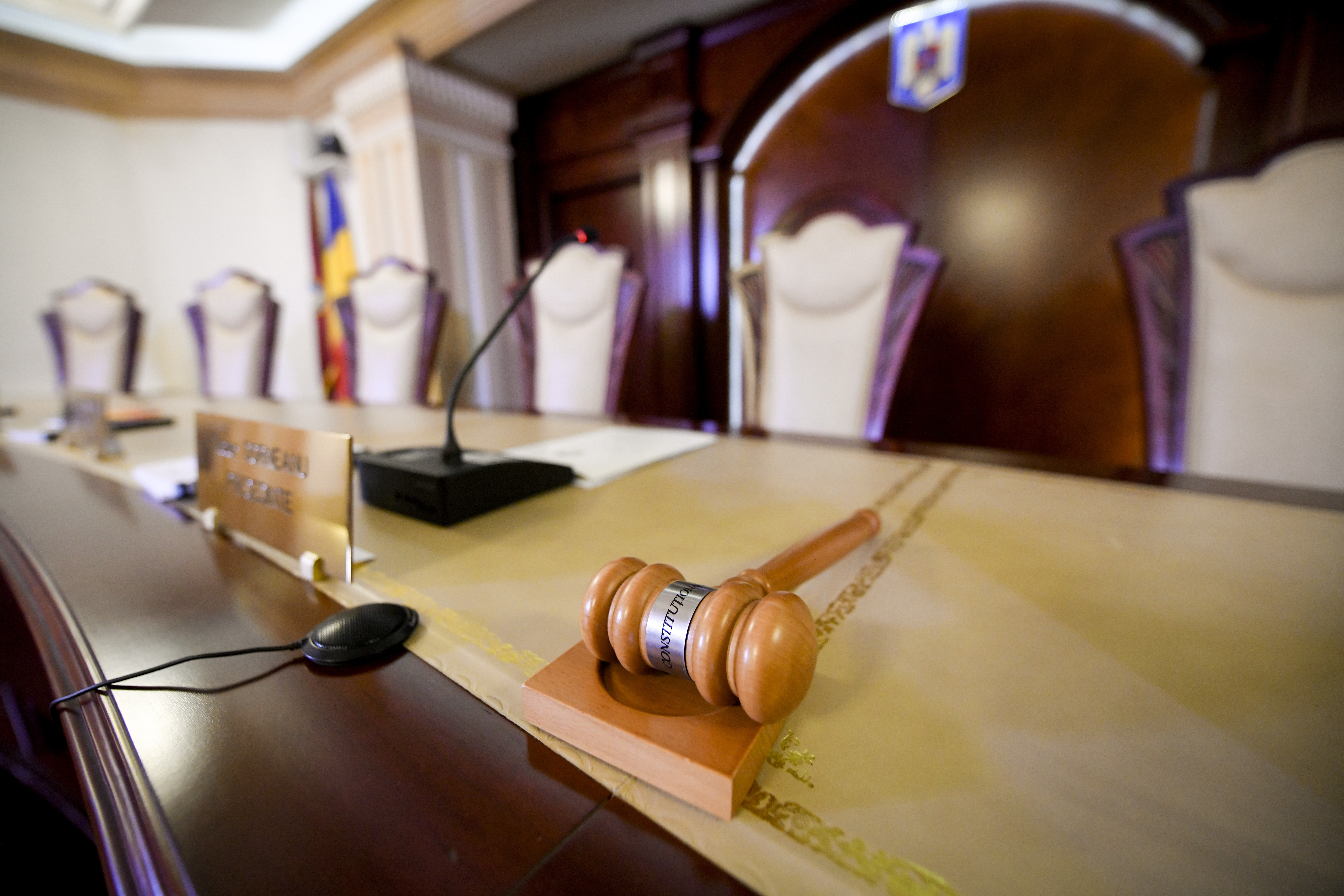 A gavel sits on the judges' table at the Constitutional Court in Bucharest, Romania, Thursday, Nov. 28, 2019. (AP Photo/Andreea Alexandru)