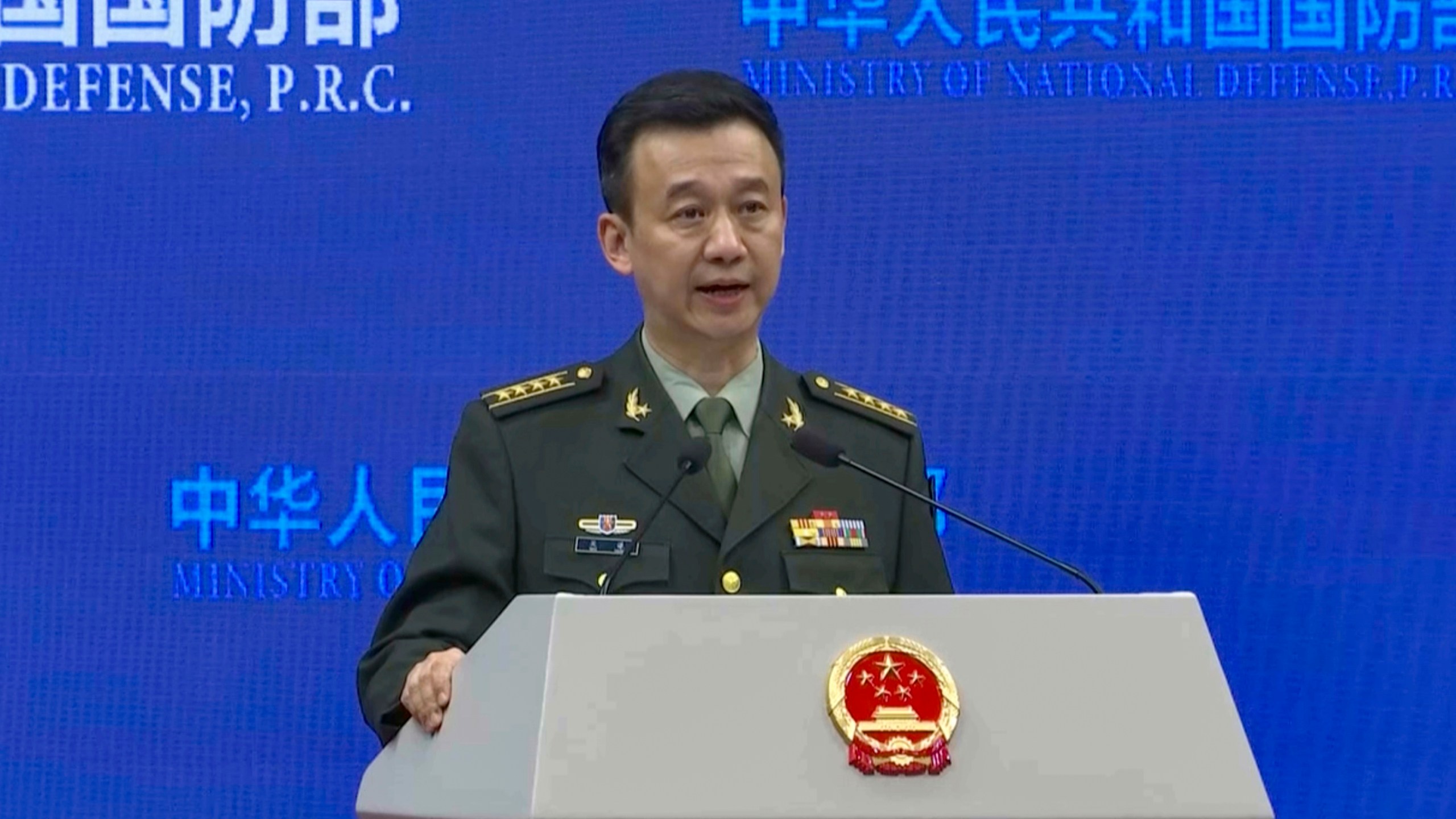 In this image from video, Wu Qian, Chinese Defense Ministry spokesperson, speaks during a Defense Ministry press conference held in Beijing, Thursday, Nov. 28, 2024. (AP Photo/Borg Wong)