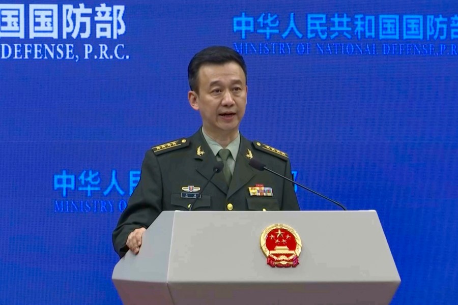 In this image from video, Wu Qian, Chinese Defense Ministry spokesperson, speaks during a Defense Ministry press conference held in Beijing, Thursday, Nov. 28, 2024. (AP Photo/Borg Wong)