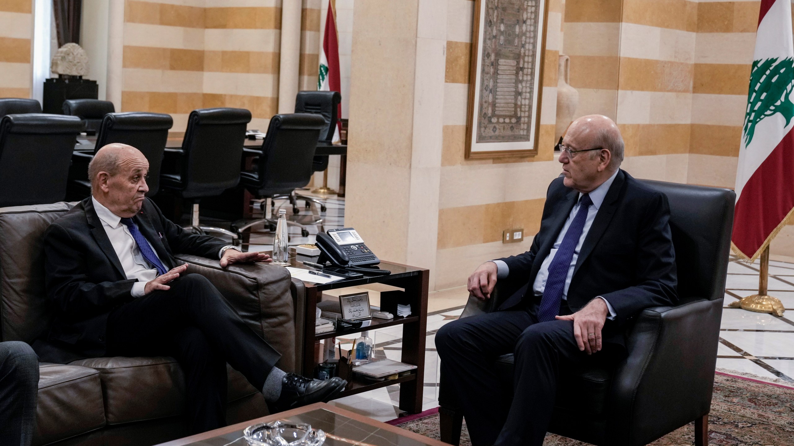 French special envoy to Lebanon Jean-Yves Le Drian, left, meets with Lebanese caretaker Prime Minister Najib Mikati, in Beirut, Lebanon, Thursday, Nov. 28, 2024. (AP Photo/Bilal Hussein)