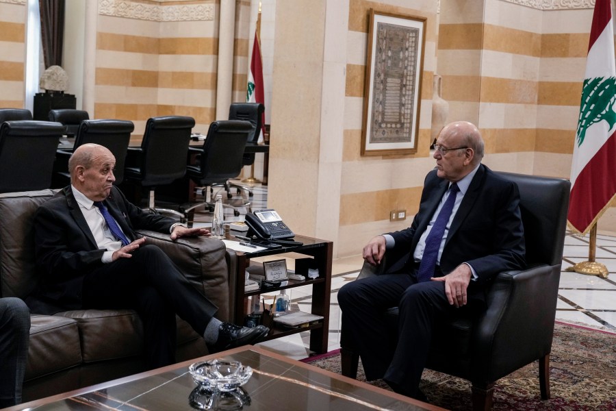 French special envoy to Lebanon Jean-Yves Le Drian, left, meets with Lebanese caretaker Prime Minister Najib Mikati, in Beirut, Lebanon, Thursday, Nov. 28, 2024. (AP Photo/Bilal Hussein)