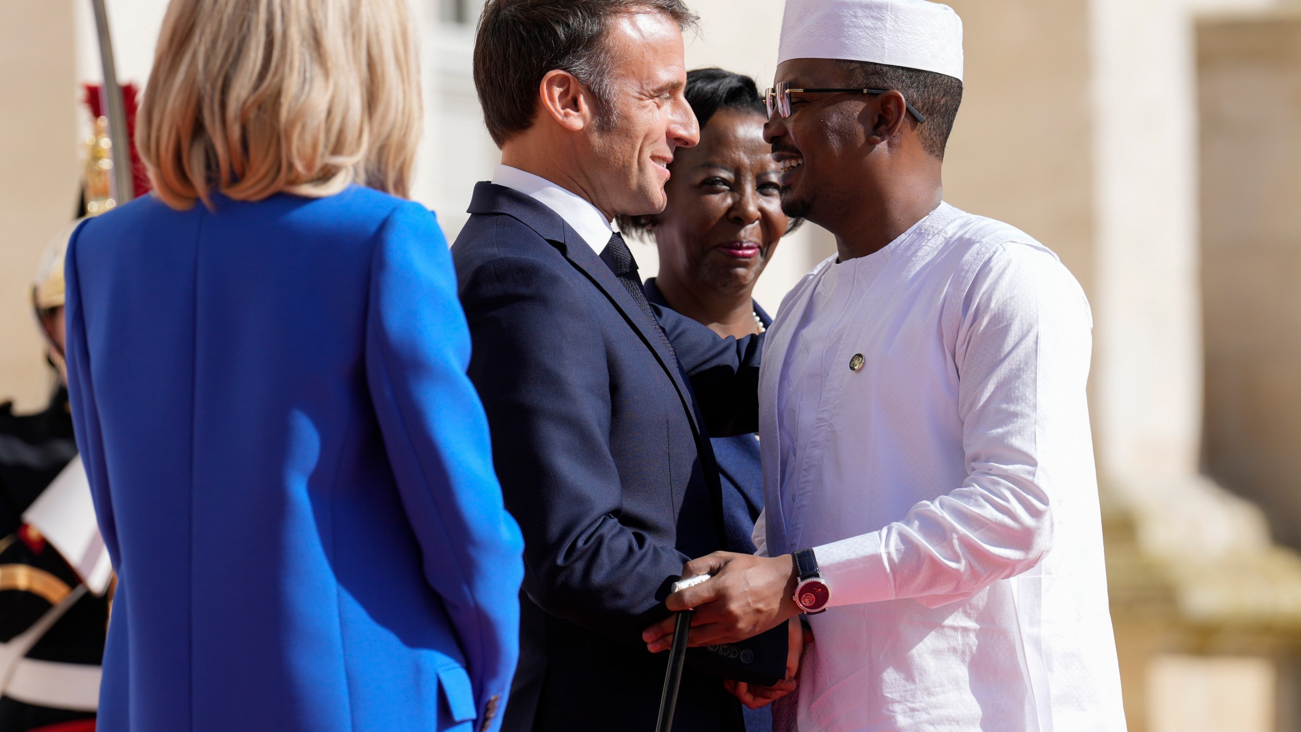 FILE -France's President Emmanuel Macron, left, and Secretary General of the Organisation Internationale de la Francophonie Louise Mushikiwabo, center, welcome Chad's President General Mahamat Idriss Deby Itno for the 19th Francophonie summit in Villers-Cotterets, France, Oct. 4, 2024. (AP Photo/Aurelien Morissard, File)