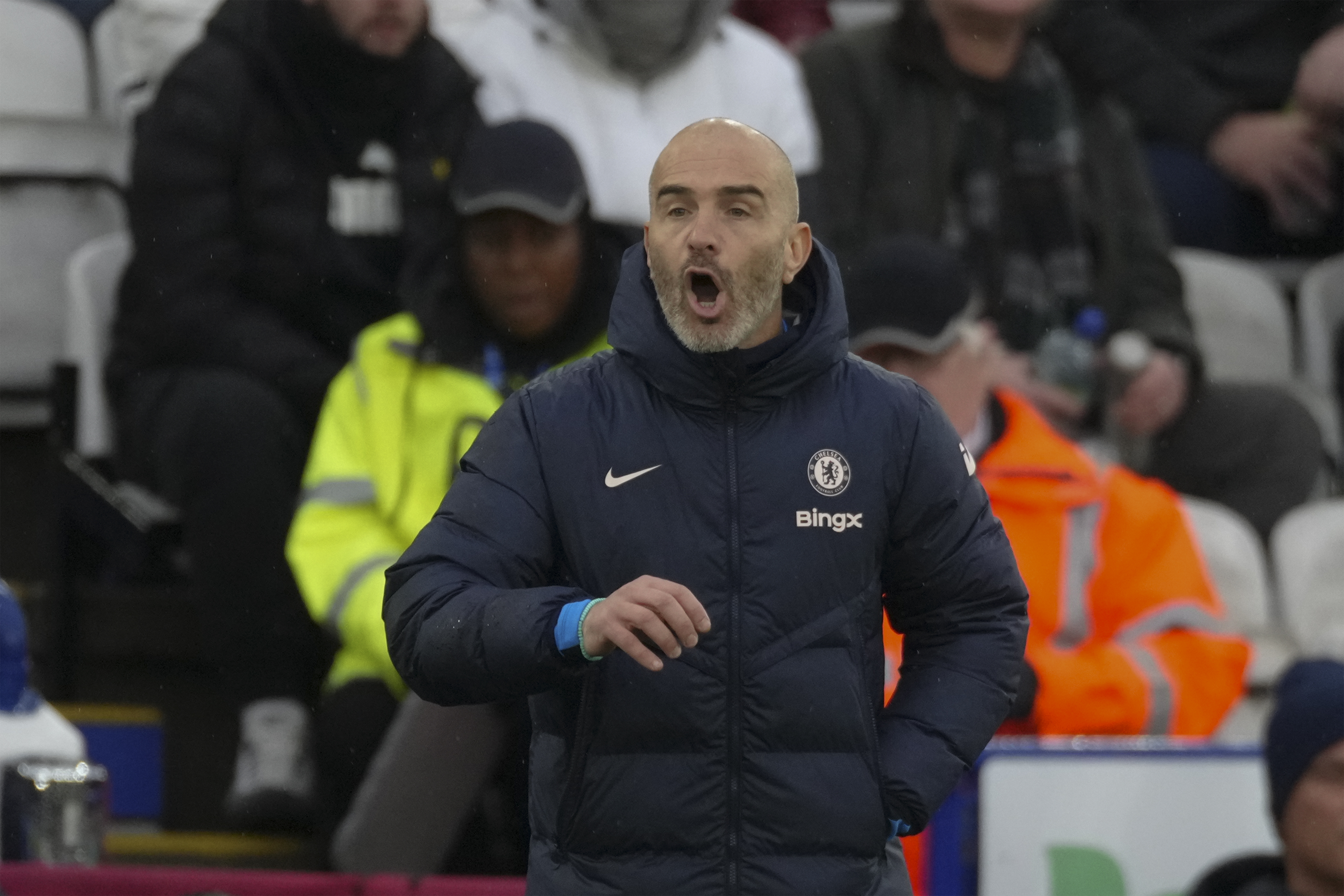 Chelsea's head coach Enzo Maresca reacts during the English Premier League soccer match between Leicester City and Chelsea at King Power stadium in Leicester, England, Saturday, Nov. 23, 2024. (AP Photo/Dave Shopland)