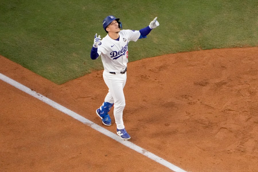 FILE - Los Angeles Dodgers' Tommy Edman celebrates as he reaches home plate after his solo home run during the second inning in Game 2 of the baseball World Series against the New York Yankees, Oct. 26, 2024, in Los Angeles. (AP Photo/Mark J. Terrill, File)