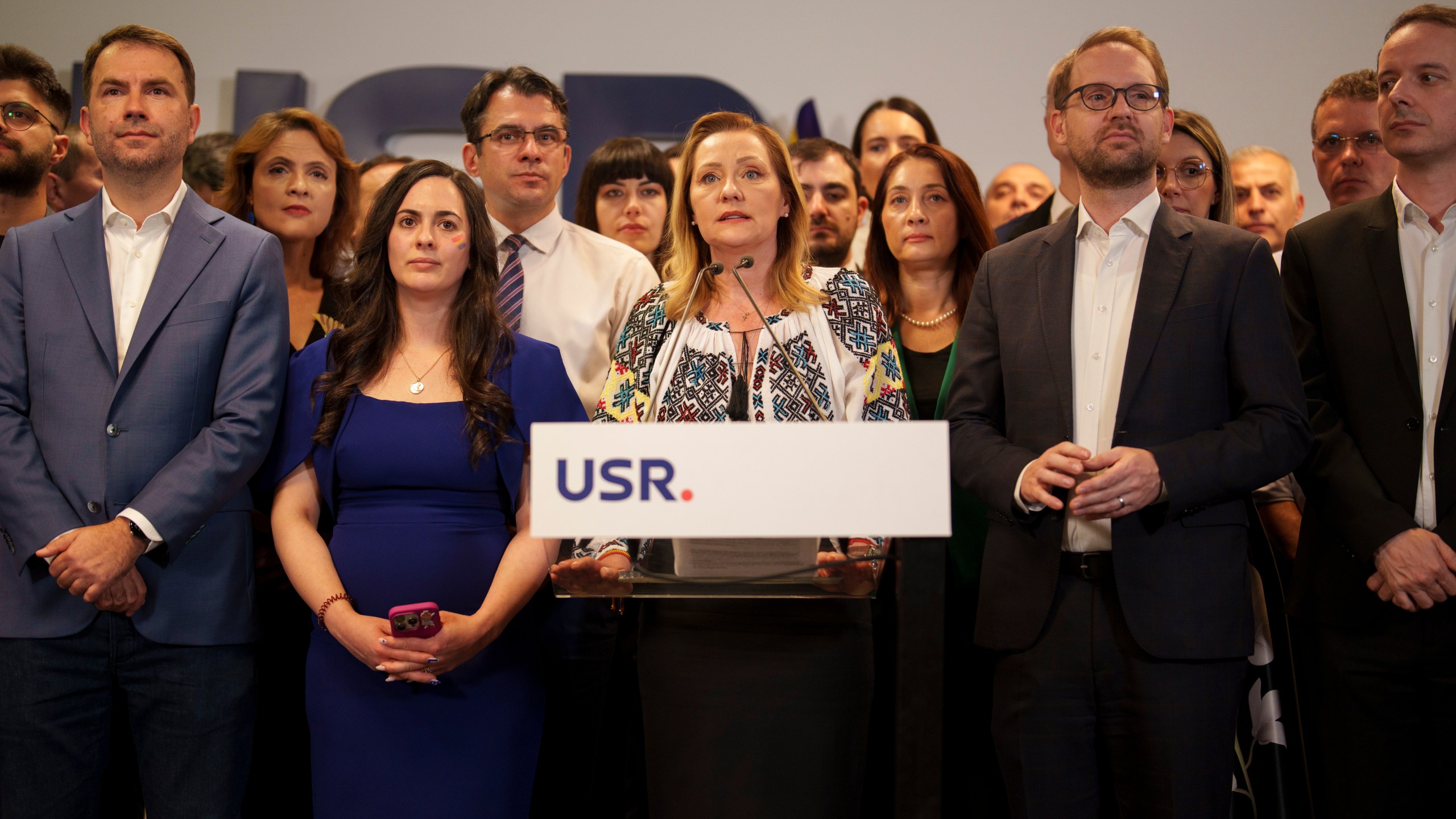 Elena Lasconi, runner up in the presidential runoff, representing the Save Romania Union, or USR, speaks after exit polls were published in the country's parliamentary elections, in Bucharest, Romania, Sunday, Dec. 1, 2024. (AP Photo/Vadim Ghirda)